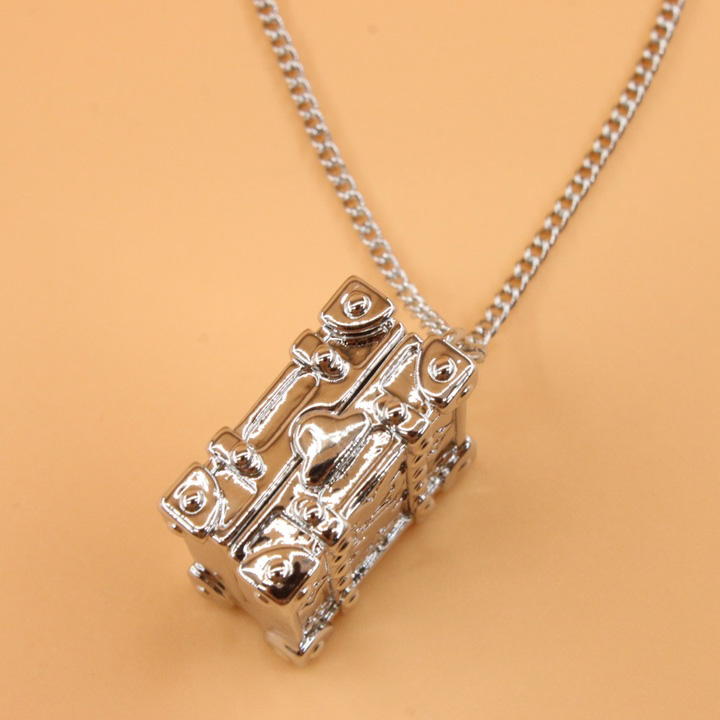 Louis Vuitton Trunk Locket Pendant      M00527 - PerfectKickZ
