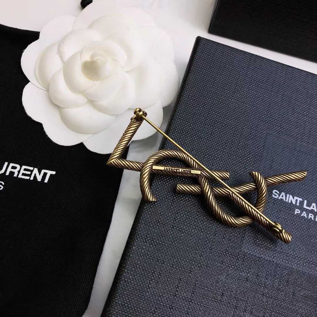 Saint Laurent Goldtone YSL Logo Brooch - PerfectKickZ