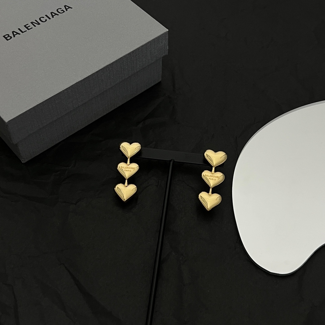 Balenciaga Women's Heart Earrings In Gold - PerfectKickZ