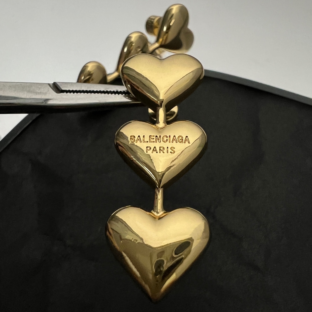 Balenciaga Women's Heart Earrings In Gold - PerfectKickZ