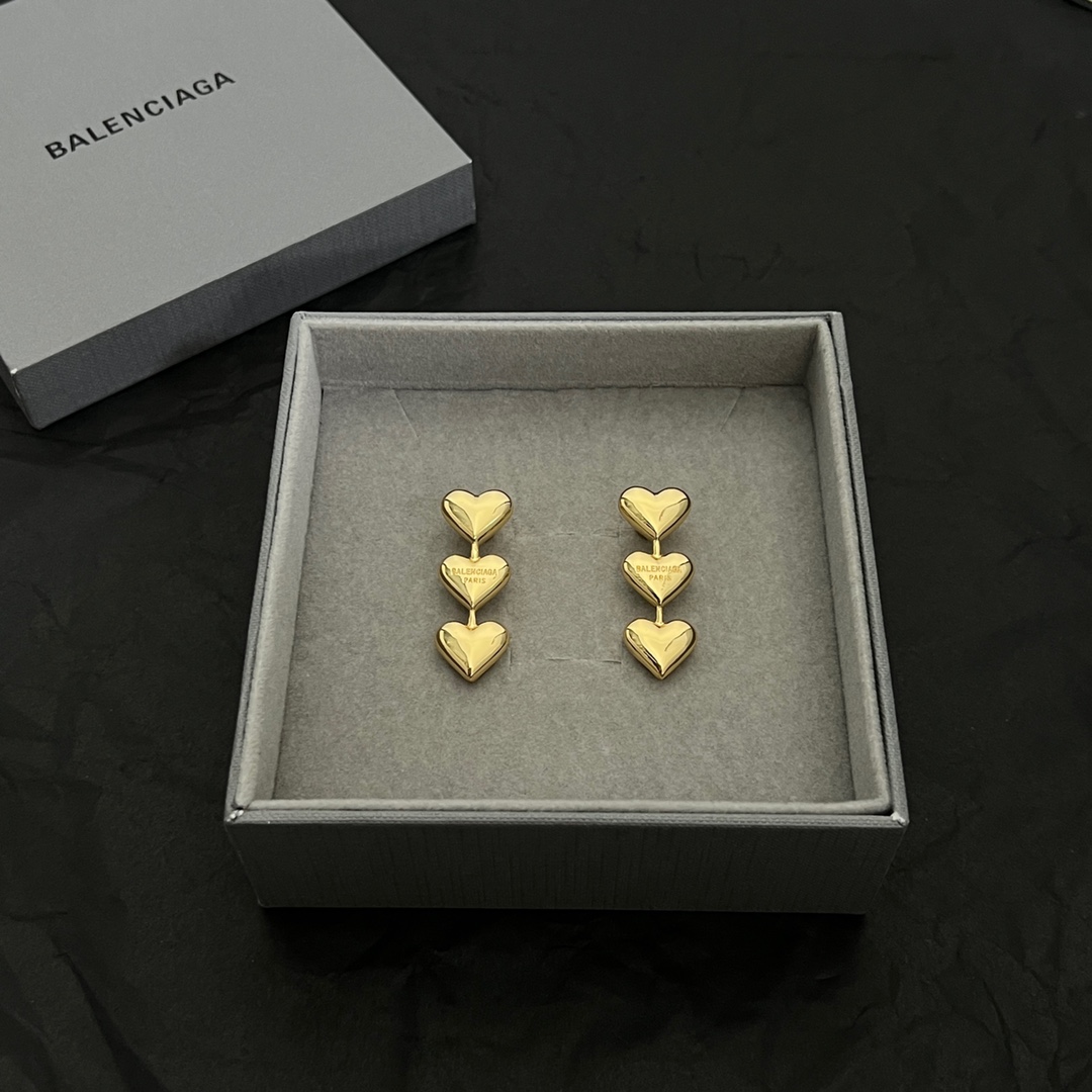 Balenciaga Women's Heart Earrings In Gold - PerfectKickZ