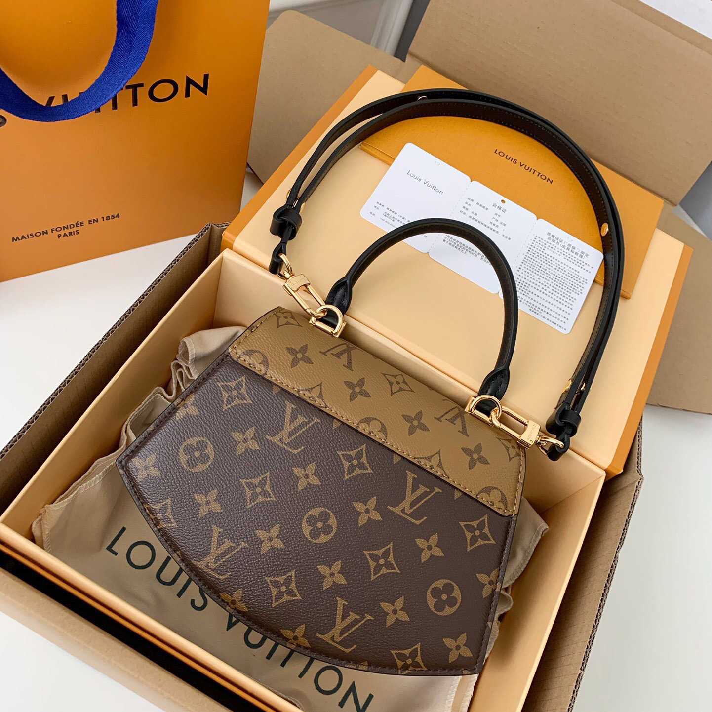 Louis Vuitton Tilsitt Handbag   M46548 - PerfectKickZ