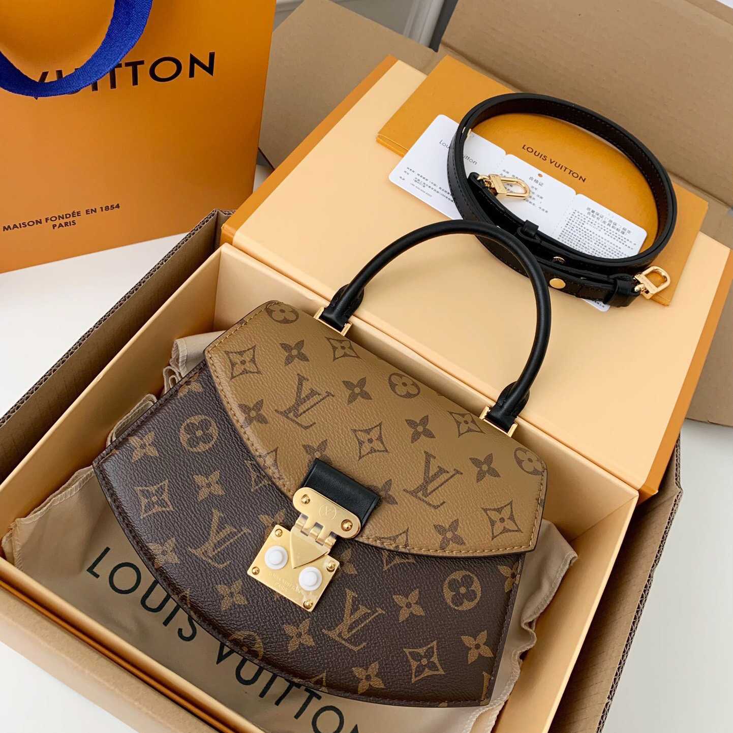 Louis Vuitton Tilsitt Handbag   M46548 - PerfectKickZ