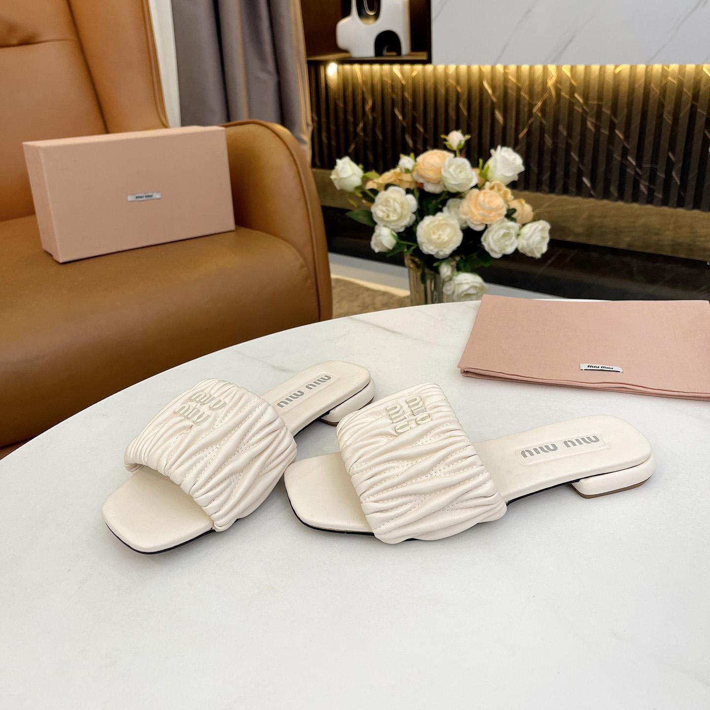 Miu Miu Matelassé Nappa Leather Slides - PerfectKickZ