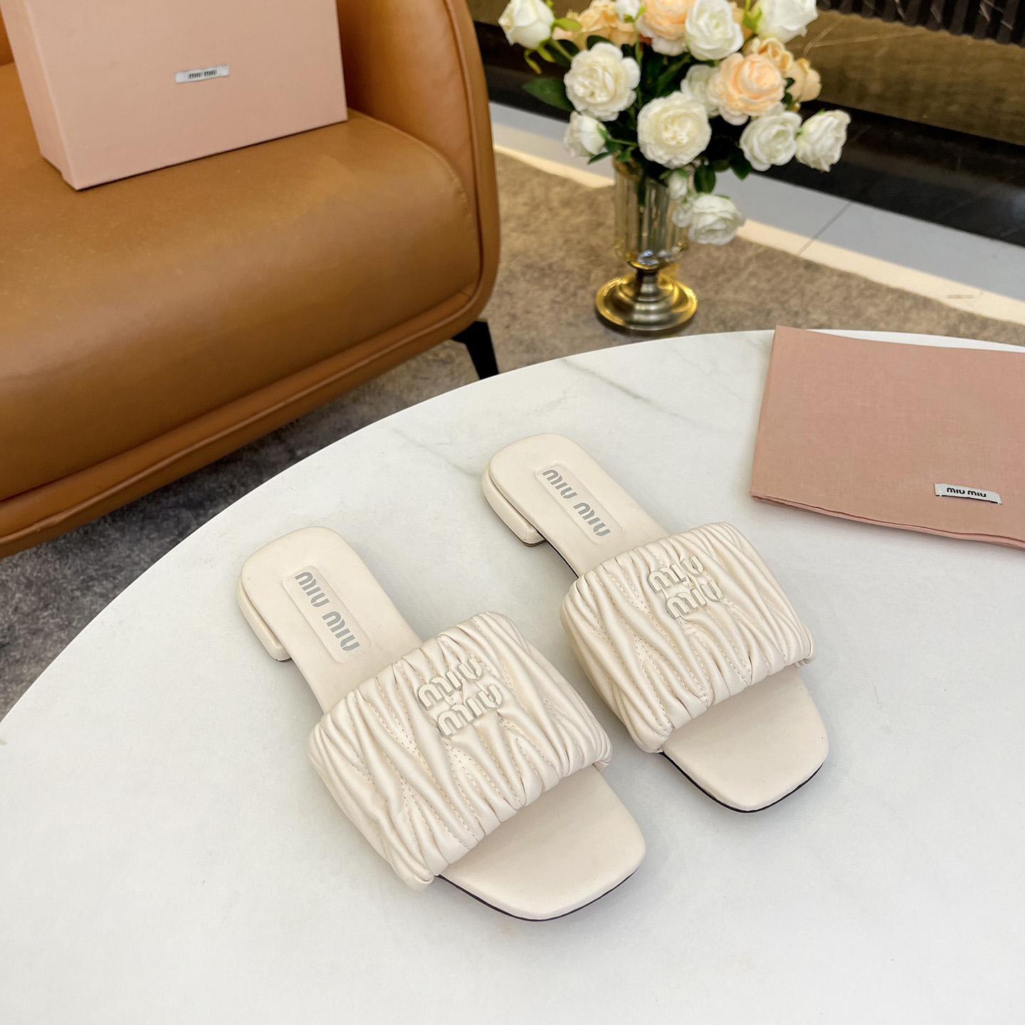 Miu Miu Matelassé Nappa Leather Slides - PerfectKickZ