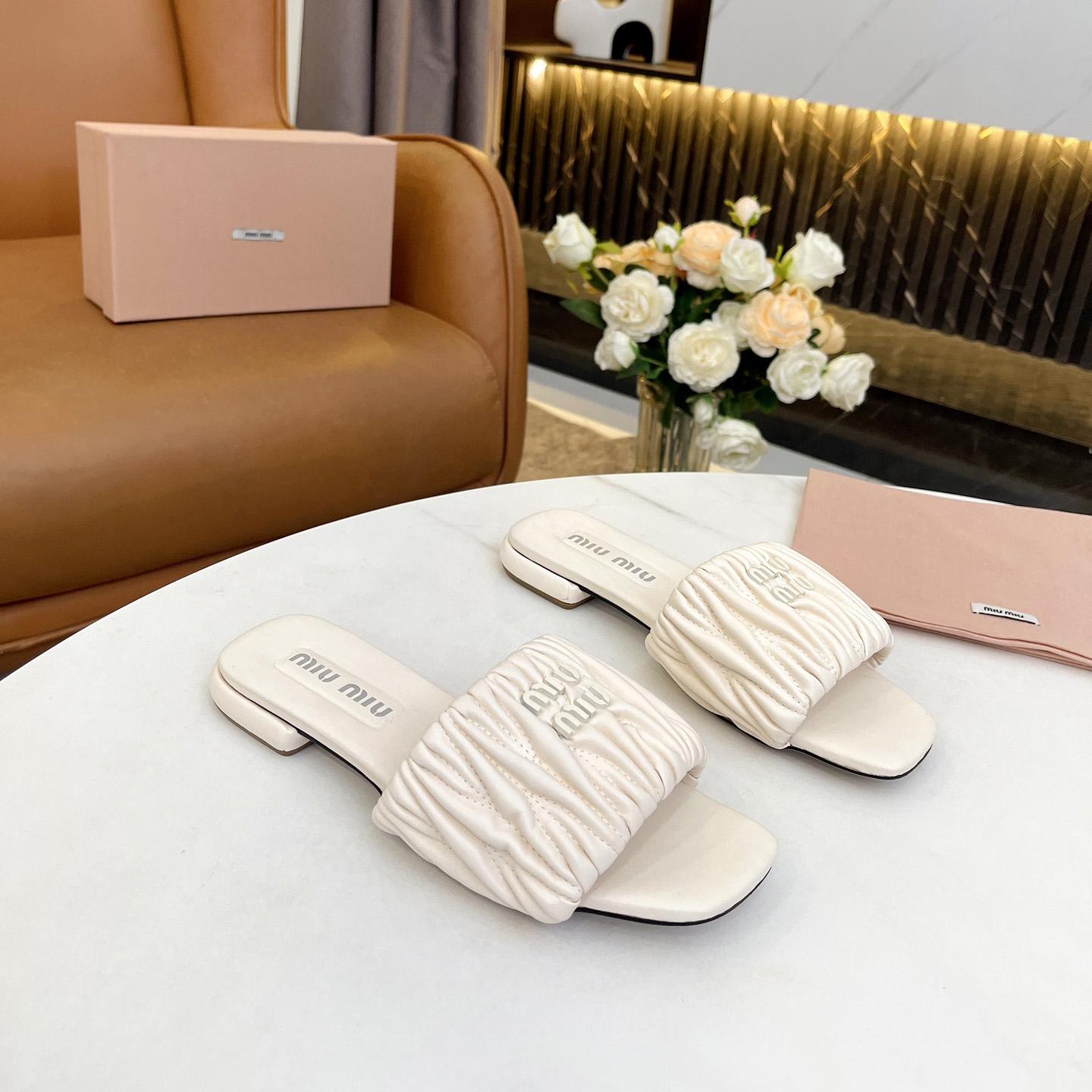 Miu Miu Matelassé Nappa Leather Slides - PerfectKickZ