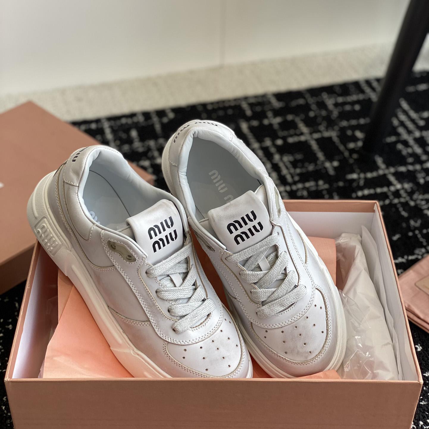 Miu Miu Bleached Leather Sneakers - PerfectKickZ
