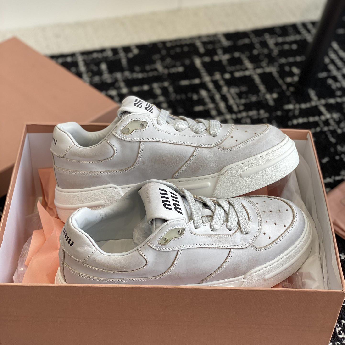 Miu Miu Bleached Leather Sneakers - 