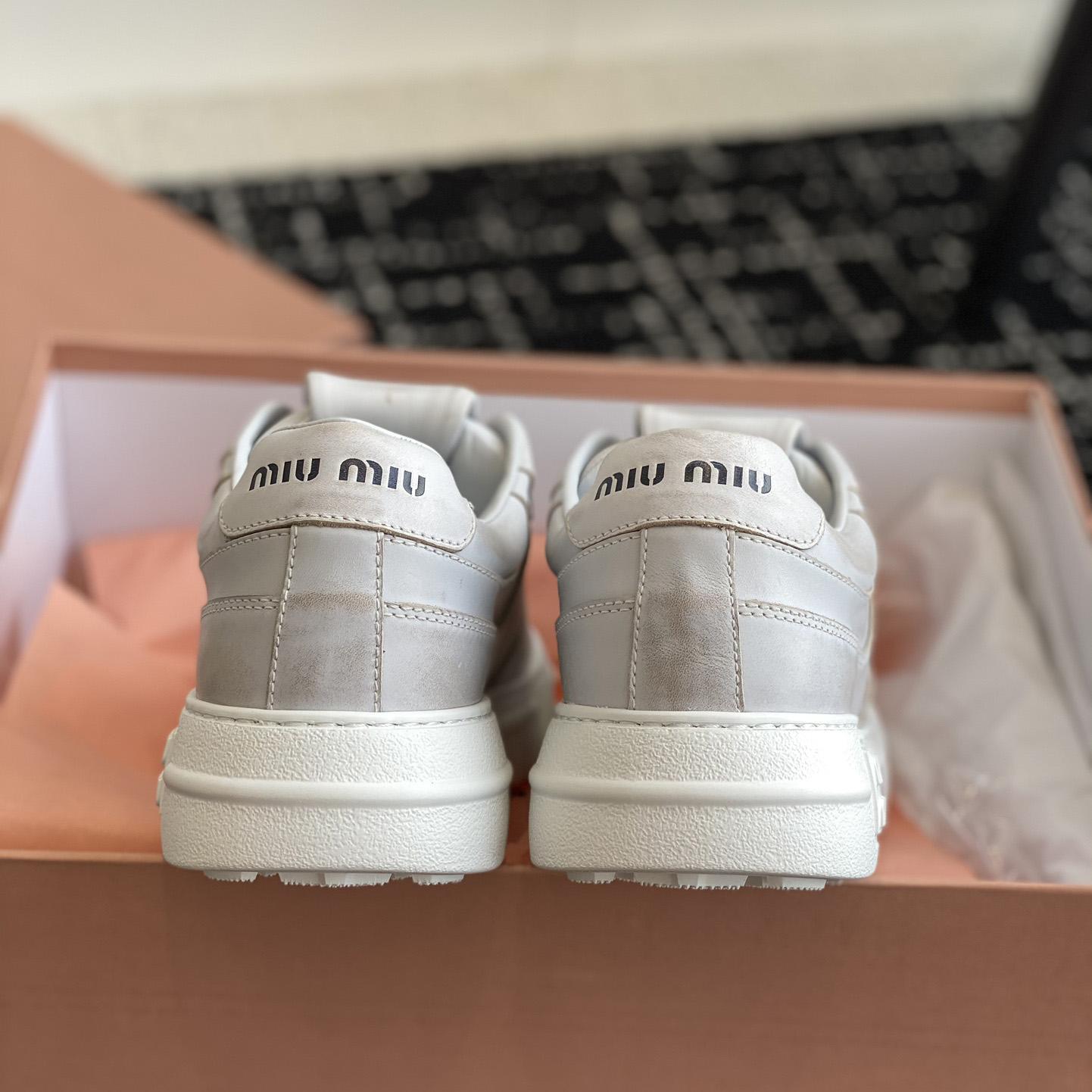 Miu Miu Bleached Leather Sneakers - 