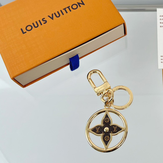 Louis Vuitton Puzzle Flower Monogram Keyring    M01207 - PerfectKickZ