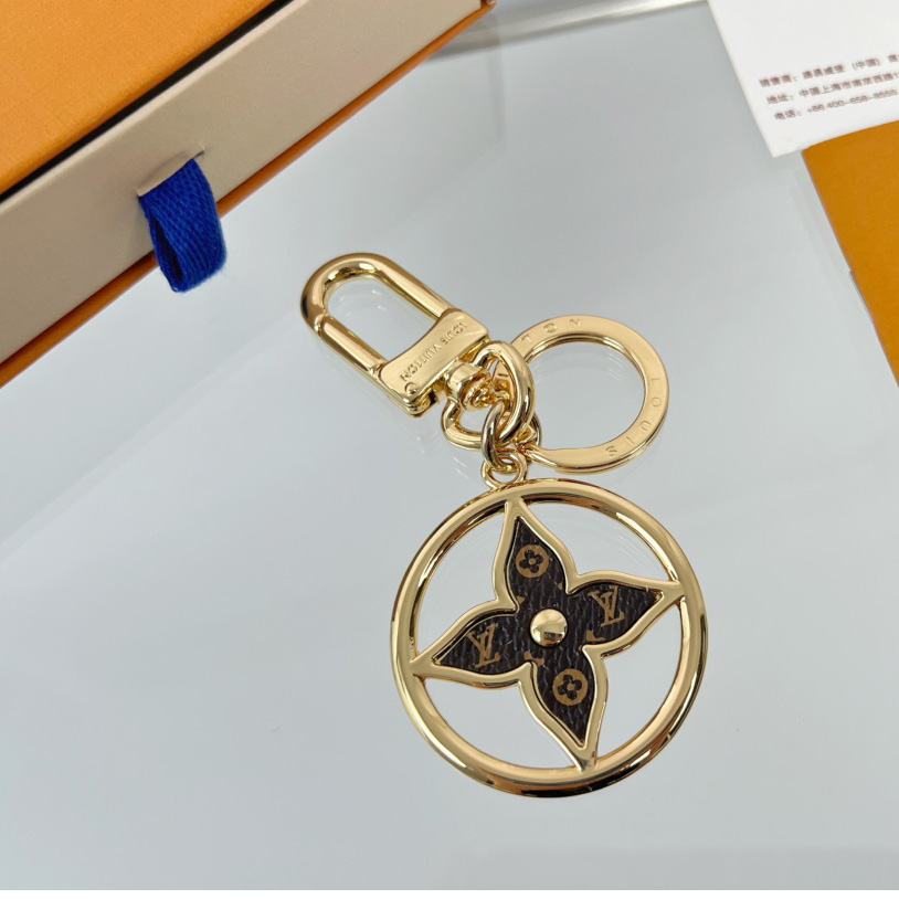 Louis Vuitton Puzzle Flower Monogram Keyring    M01207 - PerfectKickZ