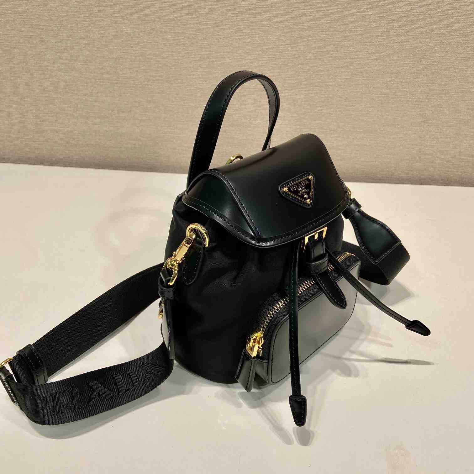 Prada Small Re-Nylon And Brushed Leather Backpack - PerfectKickZ