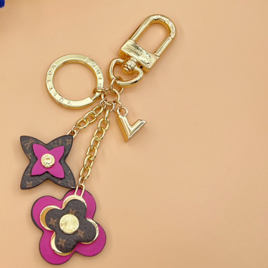 Louis Vuitton Blooming Flowers Bag Charm and Key Holder   M63084 - PerfectKickZ