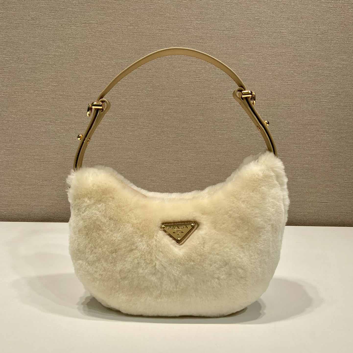 Prada Arqué Shearling And Leather Shoulder Bag - PerfectKickZ