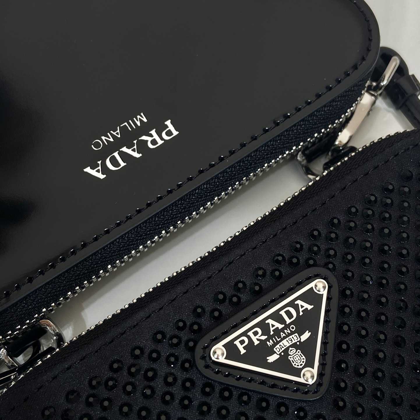 Prada Triangular Embellished Satin And Leather Mini-pouch - 