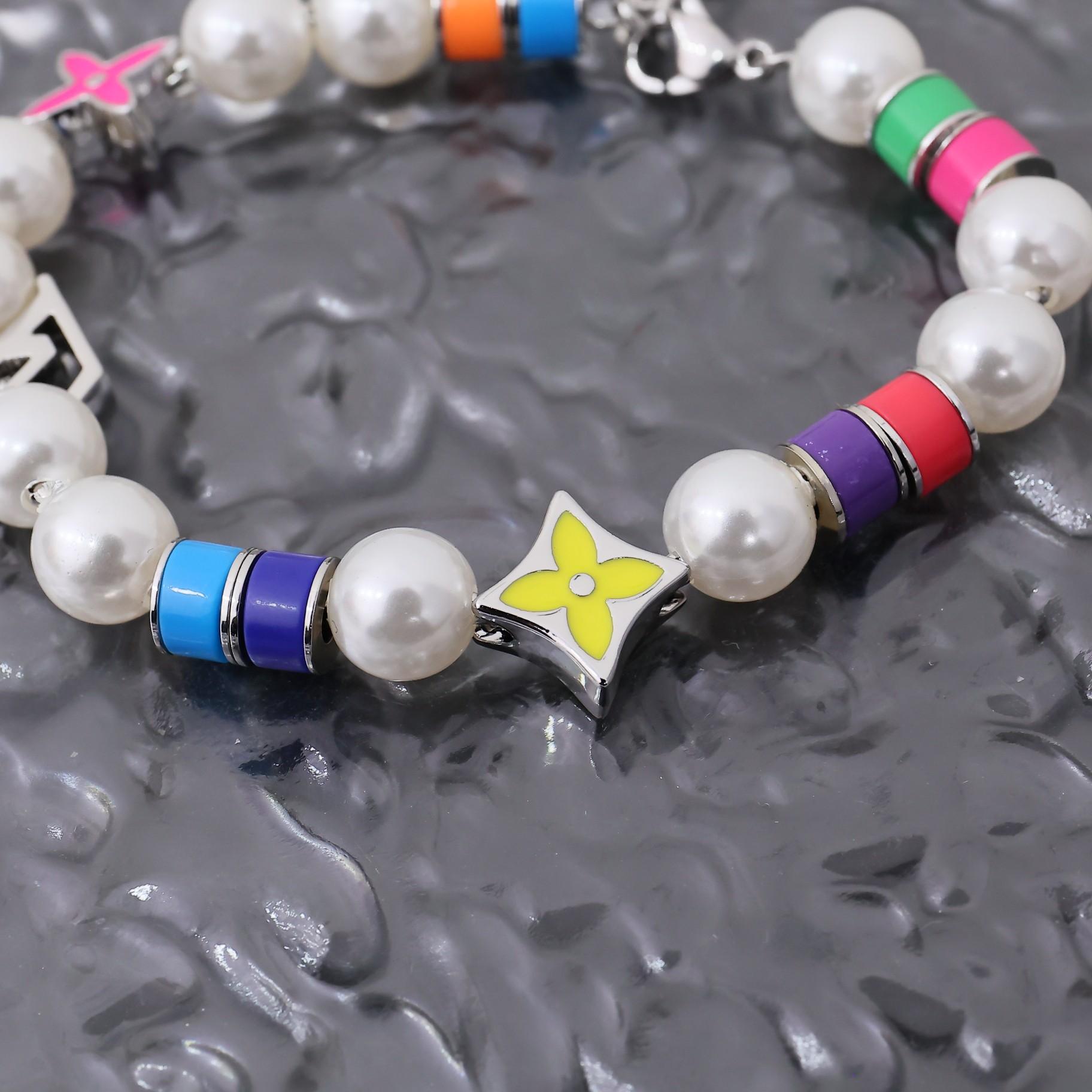 Louis Vuitton MNG Pearls Party Bracelet    M1264A - 