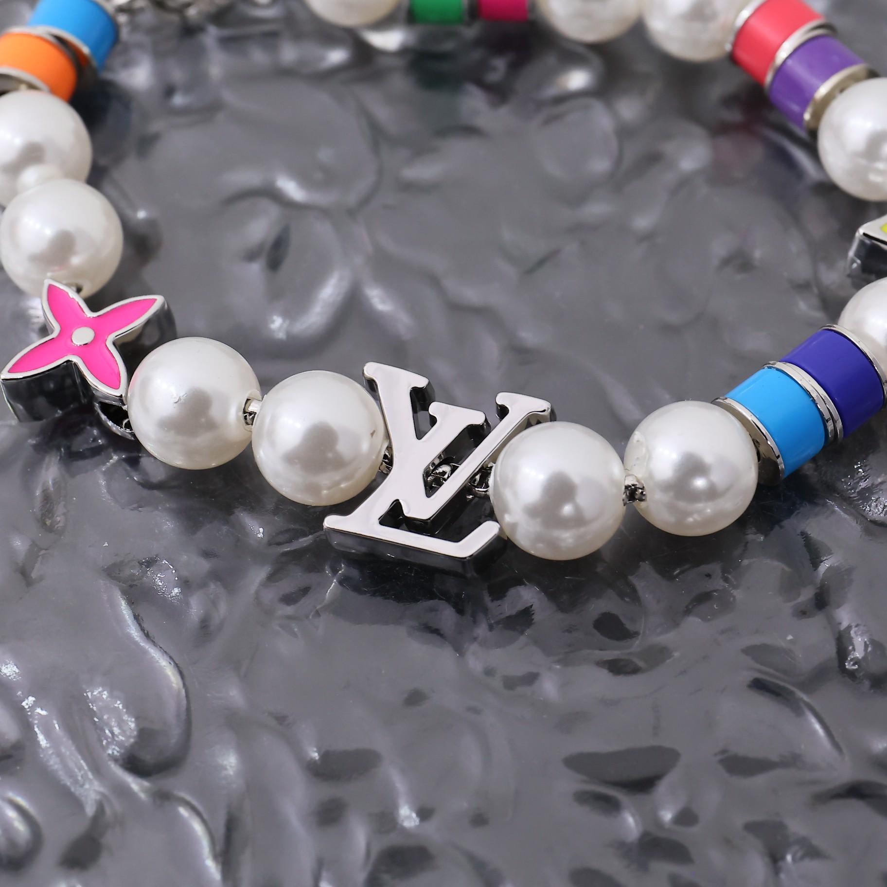 Louis Vuitton MNG Pearls Party Bracelet    M1264A - 