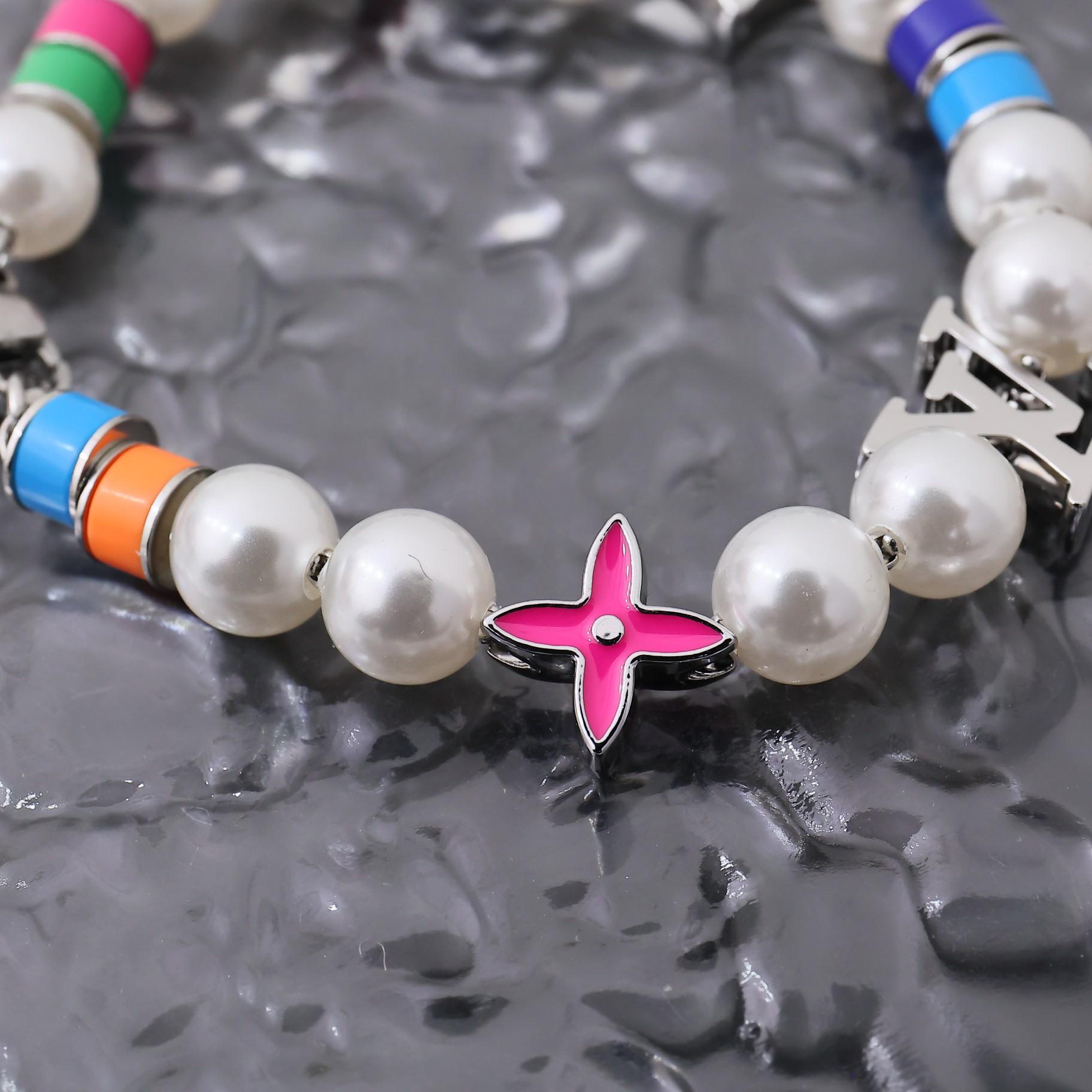 Louis Vuitton MNG Pearls Party Bracelet    M1264A - 