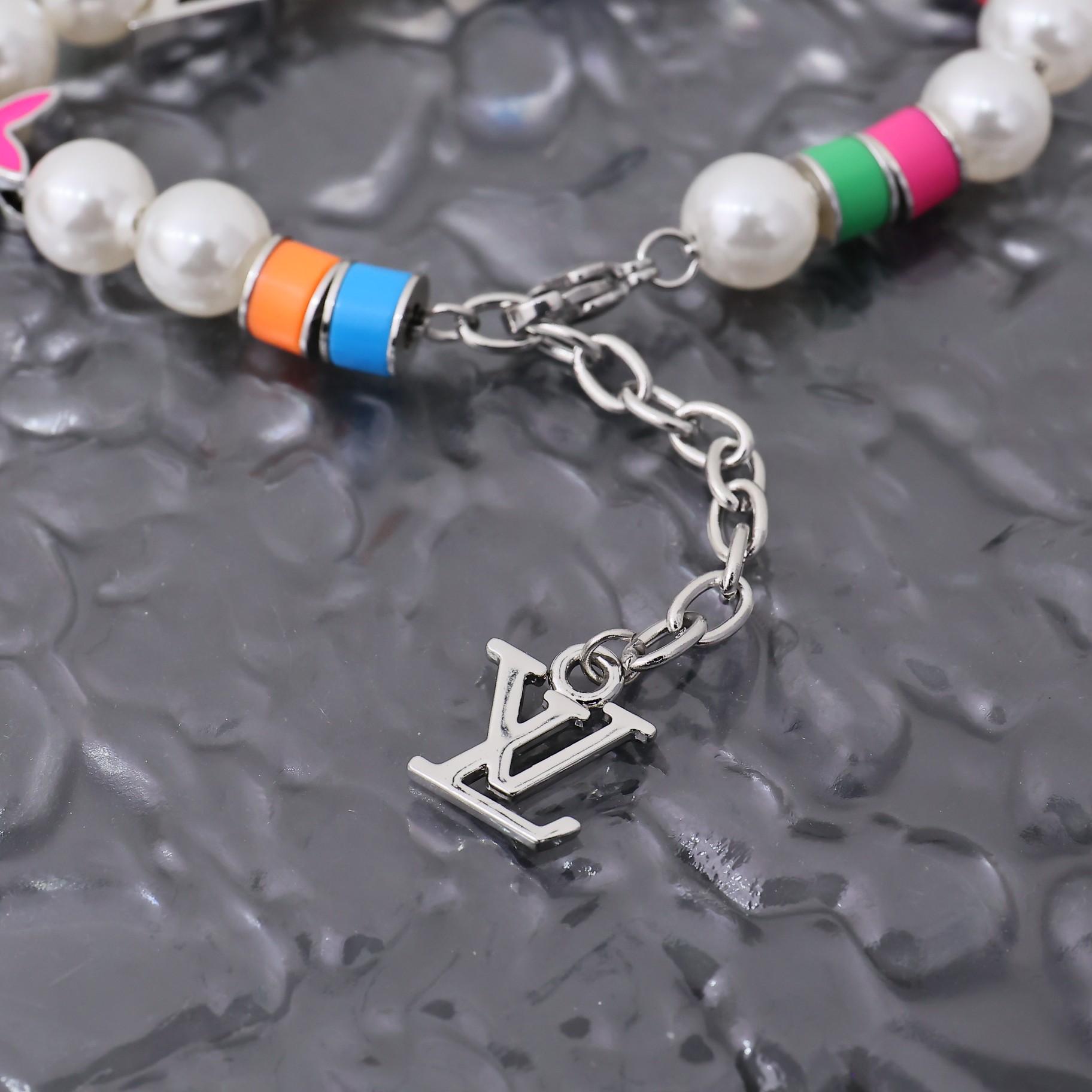 Louis Vuitton MNG Pearls Party Bracelet    M1264A - 
