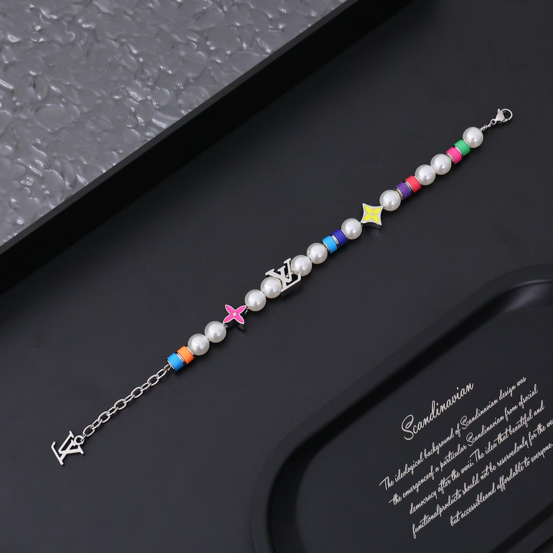 Louis Vuitton MNG Pearls Party Bracelet    M1264A - 