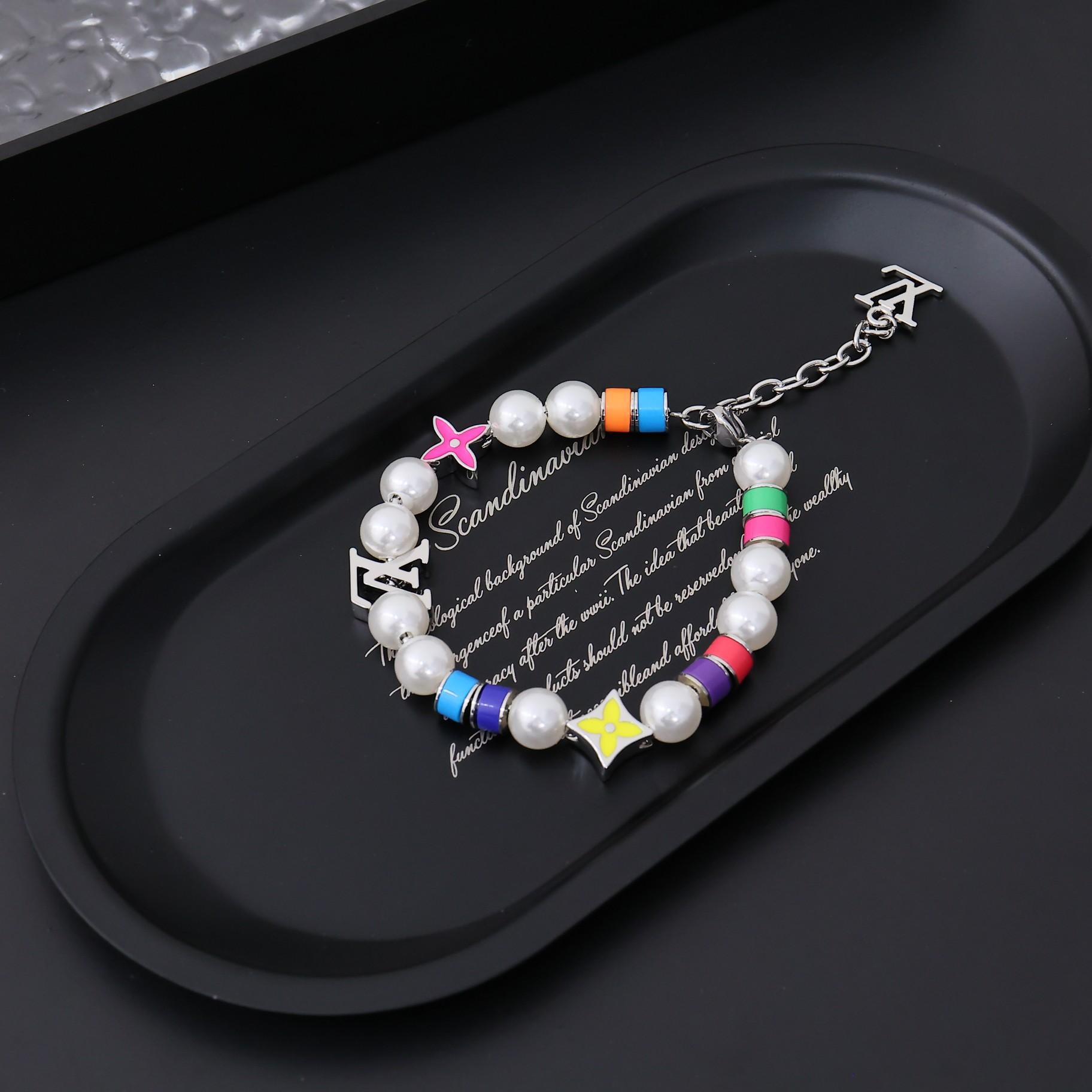 Louis Vuitton MNG Pearls Party Bracelet    M1264A - 