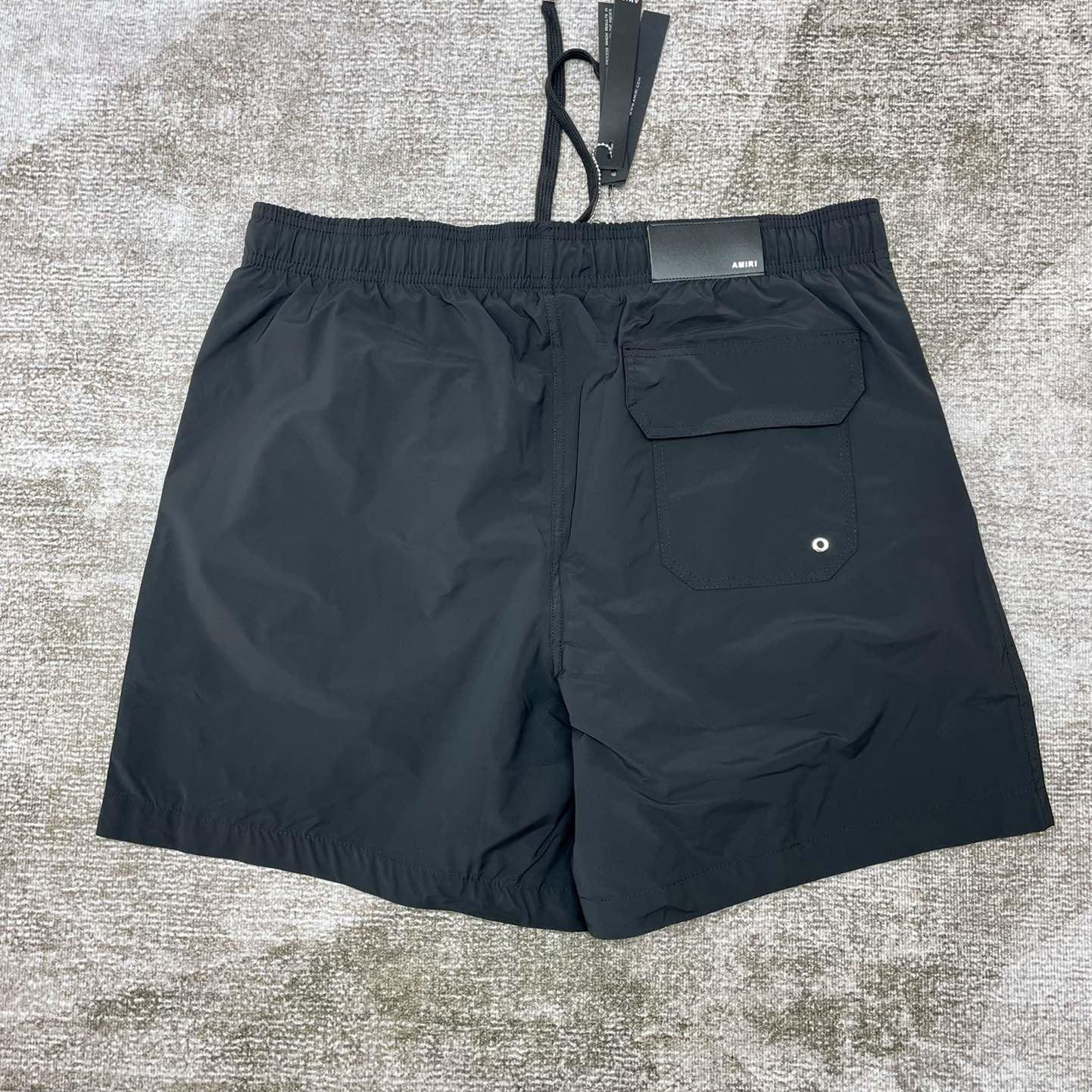Amiri Stack Logo Swim Shorts       x777 - PerfectKickZ