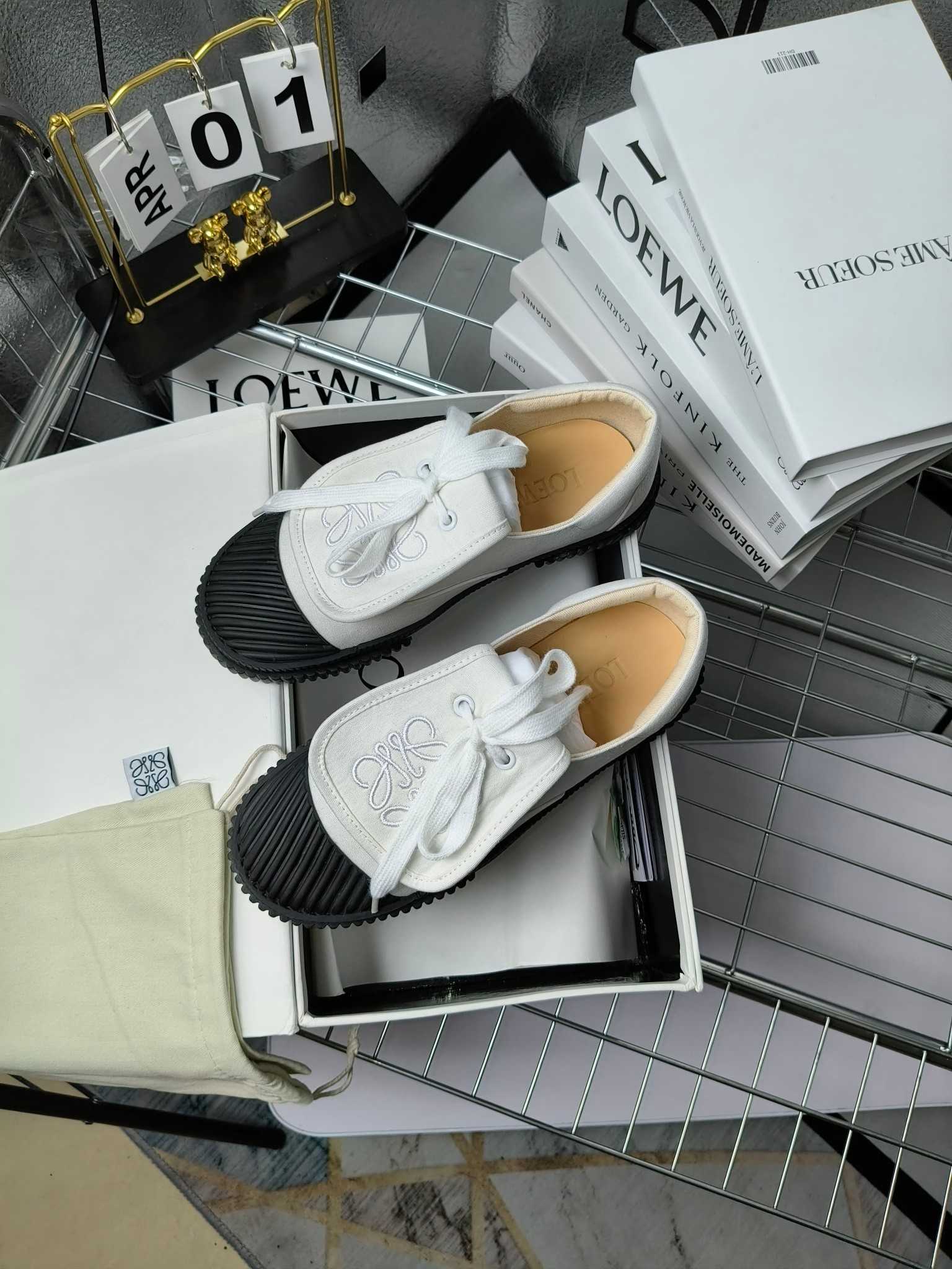 Loewe Anagram Embroidered Flap Low-Top Sneakers - PerfectKickZ