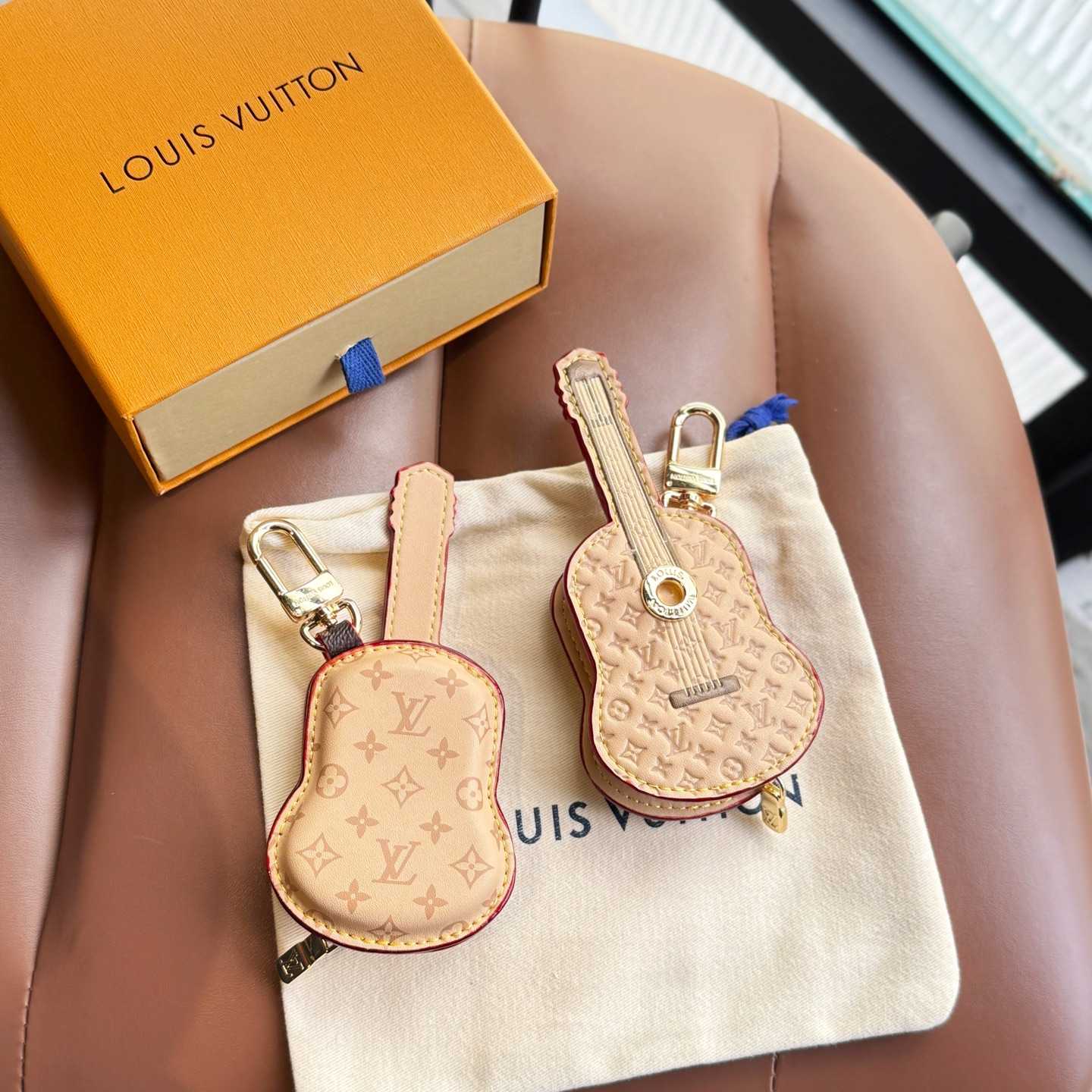 Louis Vuitton Guitar Pouch Bag Charm   M02032 - PerfectKickZ