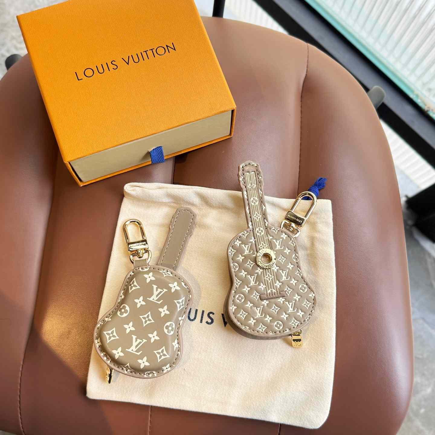 Louis Vuitton Guitar Pouch Bag Charm   M02032 - PerfectKickZ