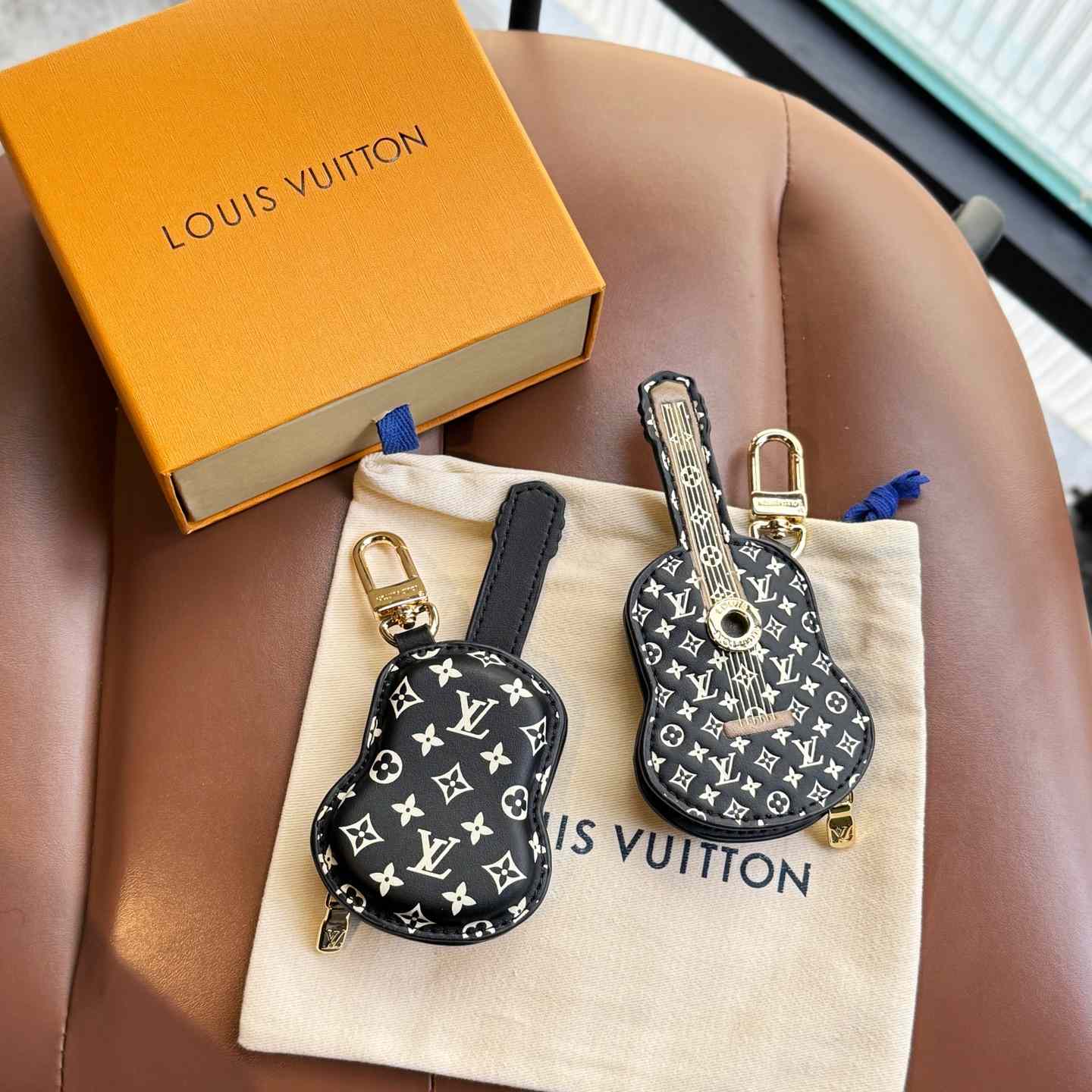 Louis Vuitton Guitar Pouch Bag Charm   M02032 - PerfectKickZ
