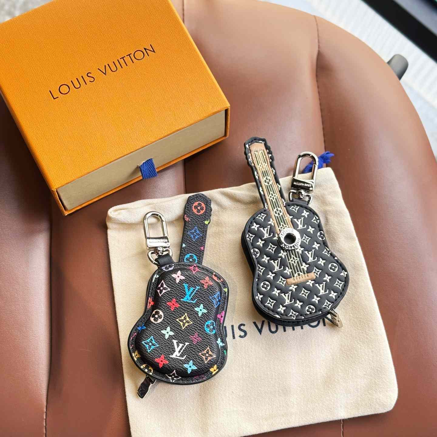 Louis Vuitton Guitar Pouch Bag Charm   M02032 - PerfectKickZ