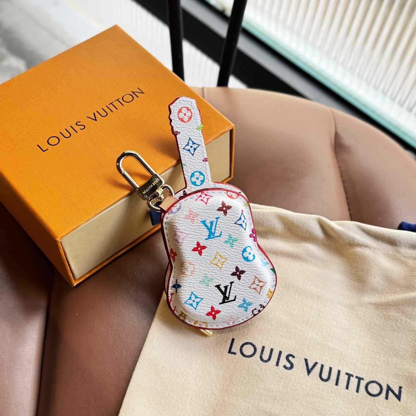 Louis Vuitton Guitar Pouch Bag Charm   M02032 - PerfectKickZ