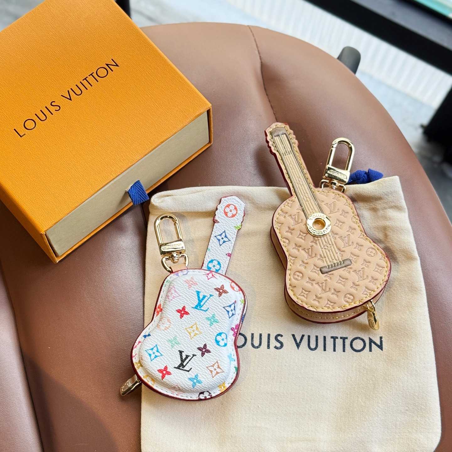 Louis Vuitton Guitar Pouch Bag Charm   M02032 - PerfectKickZ