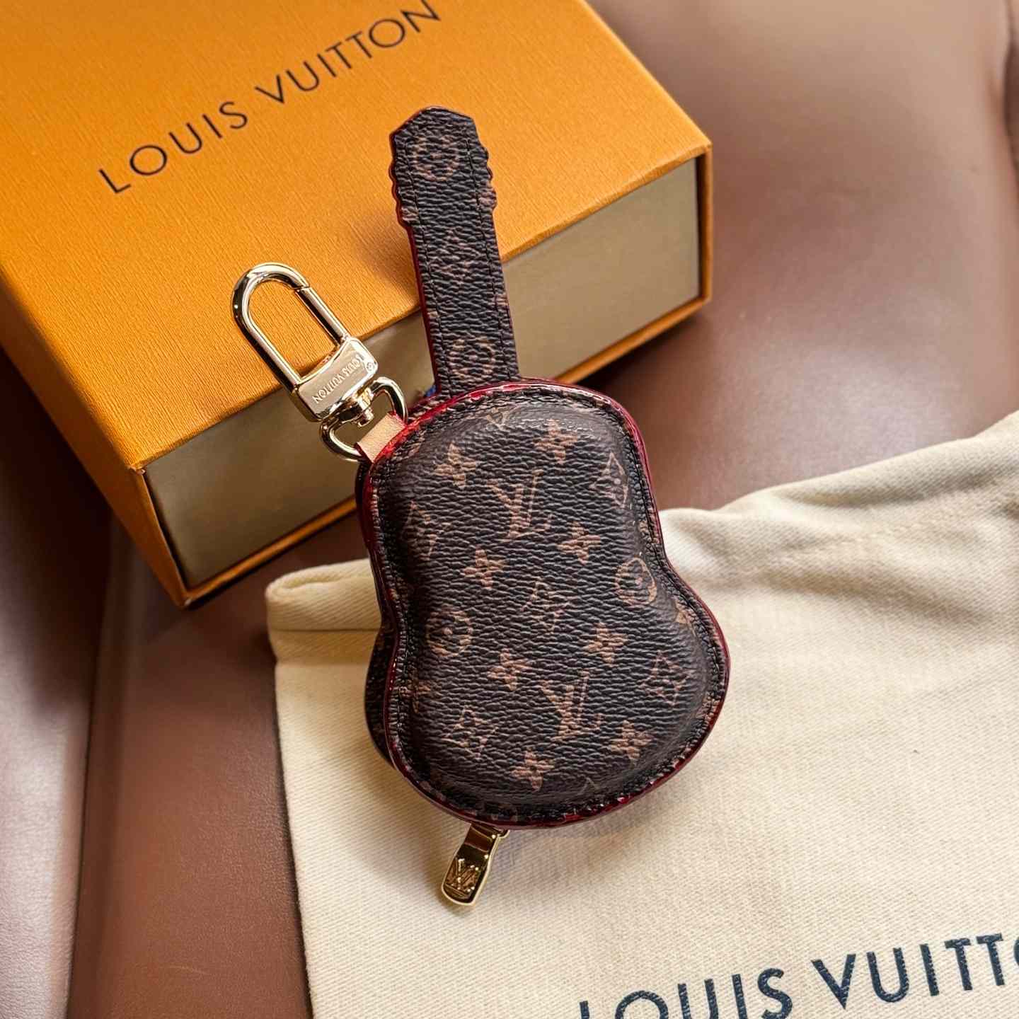 Louis Vuitton Guitar Pouch Bag Charm   M02032 - PerfectKickZ