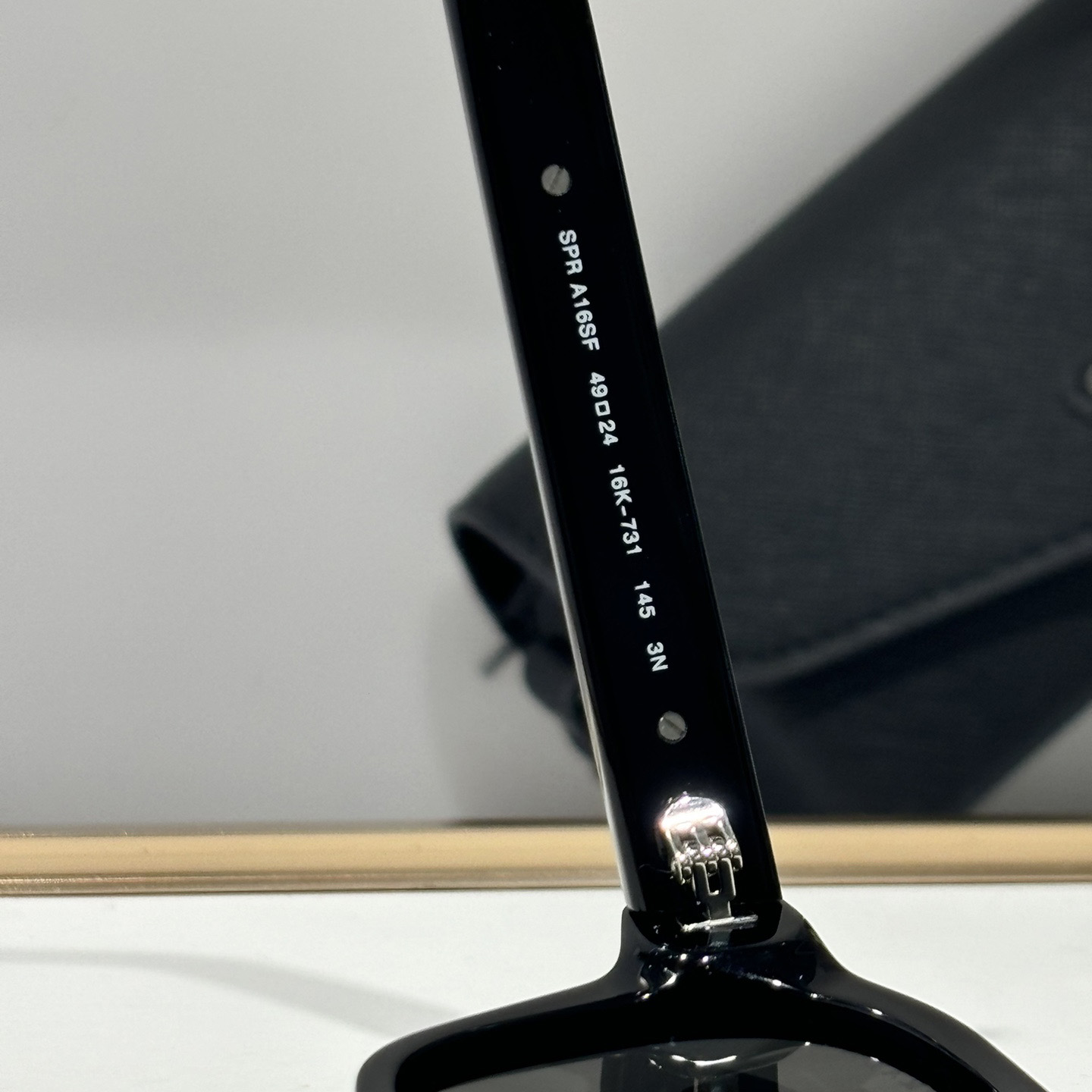Prada Sunglasses With Iconic Metal Plaque   SPR A16SF - PerfectKickZ
