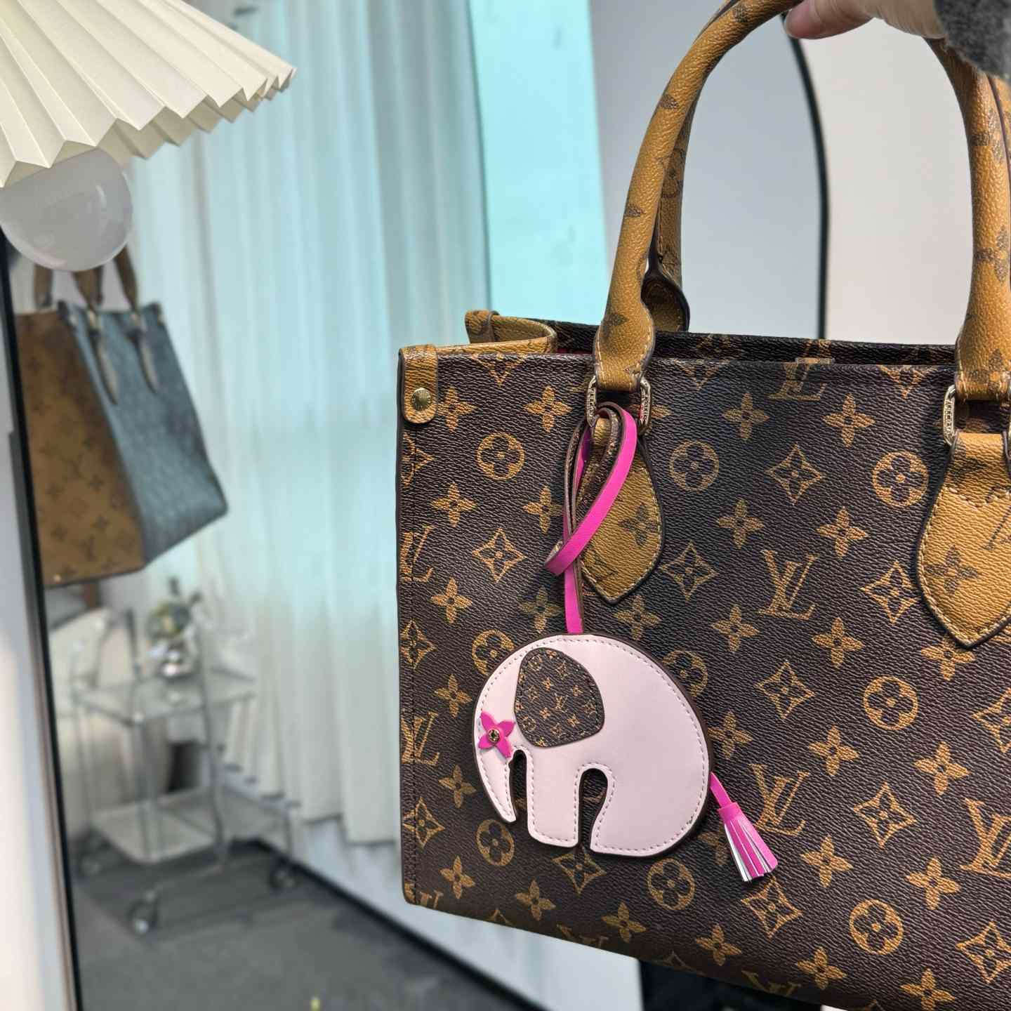 Louis Vuitton LV Elephant Bag Charm   M02383 - PerfectKickZ