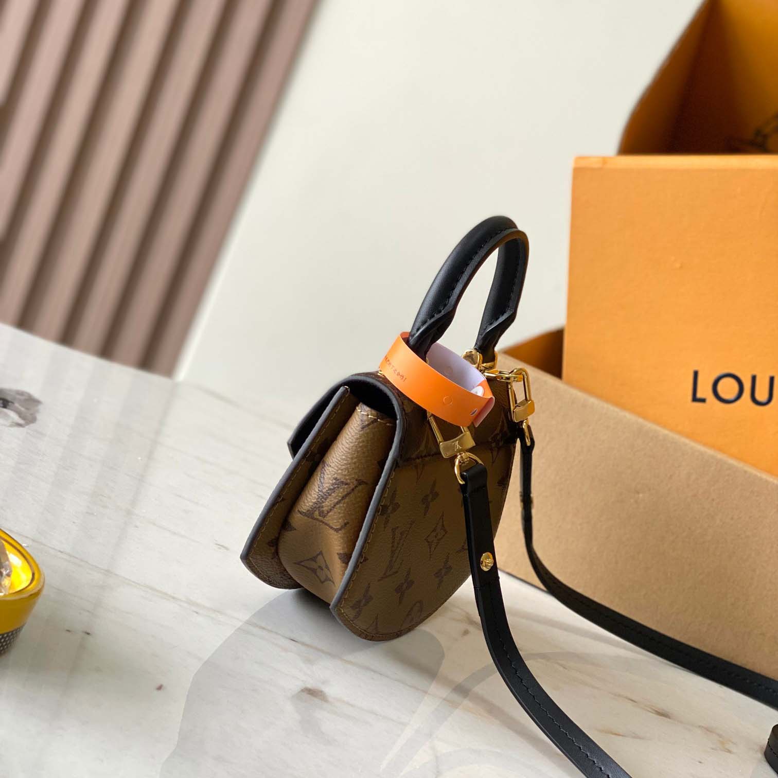 Louis Vuitton Tilsitt Handbag   M83473 - PerfectKickZ