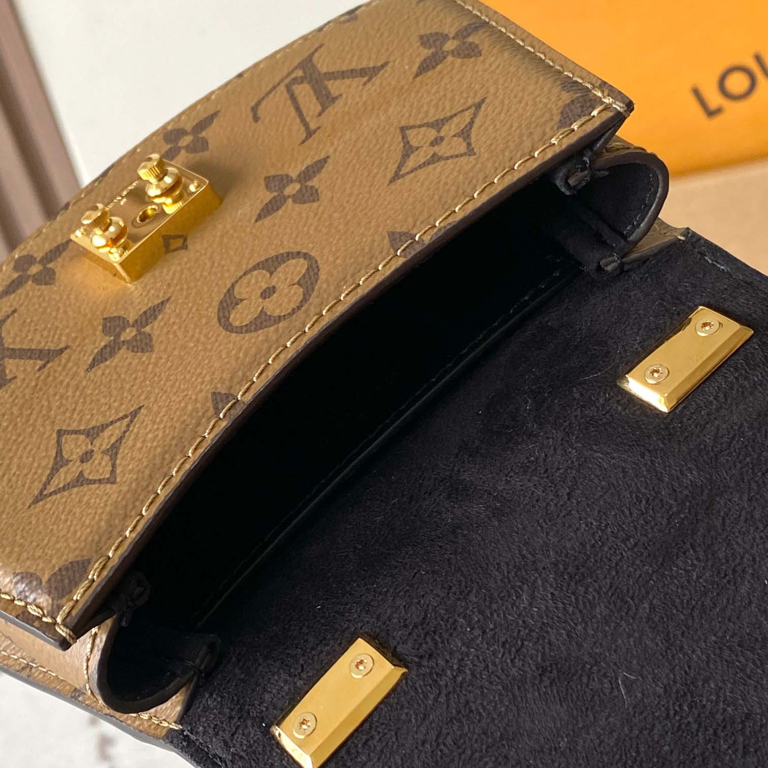 Louis Vuitton Tilsitt Handbag   M83473 - PerfectKickZ