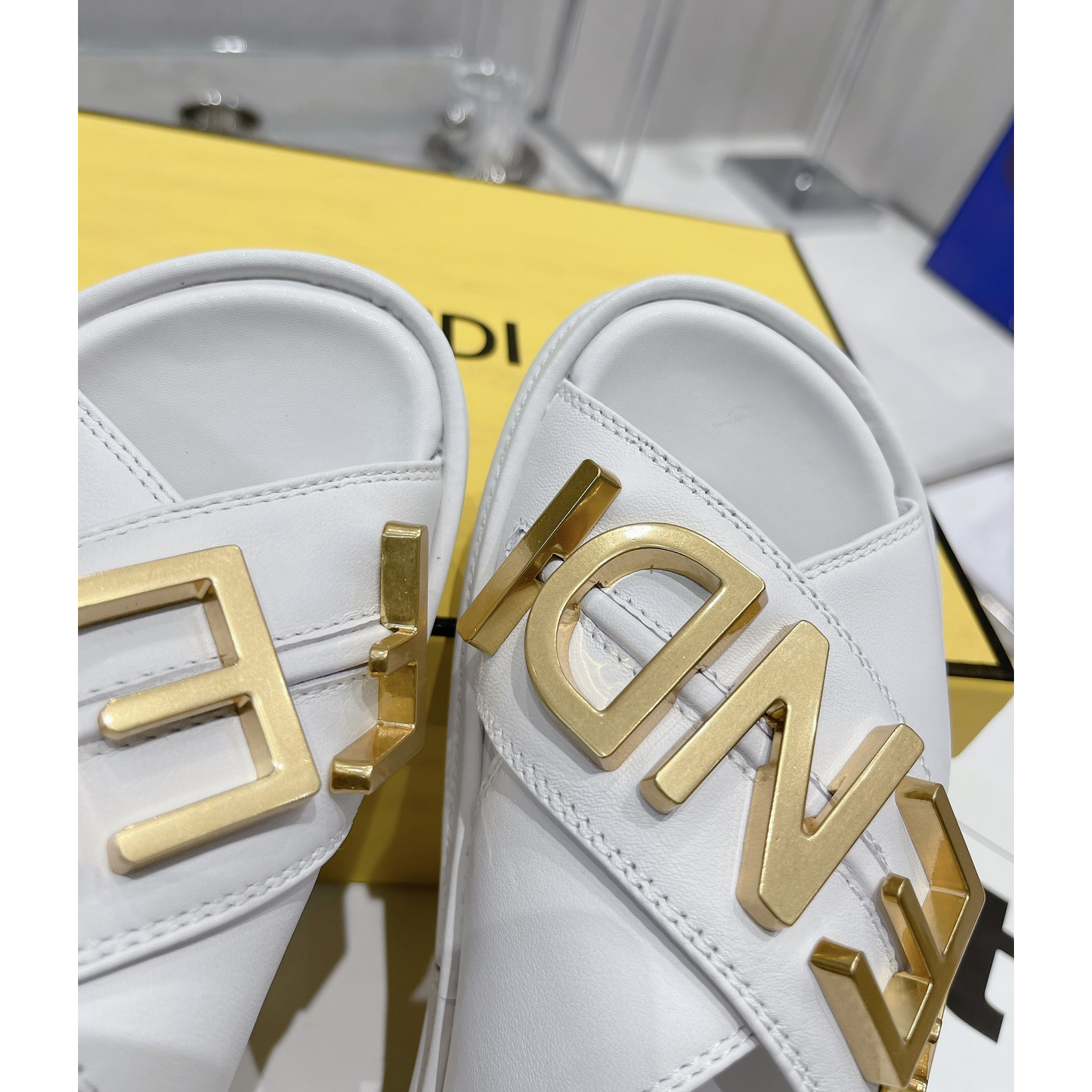 Fendi Graphy White Leather Slides - PerfectKickZ
