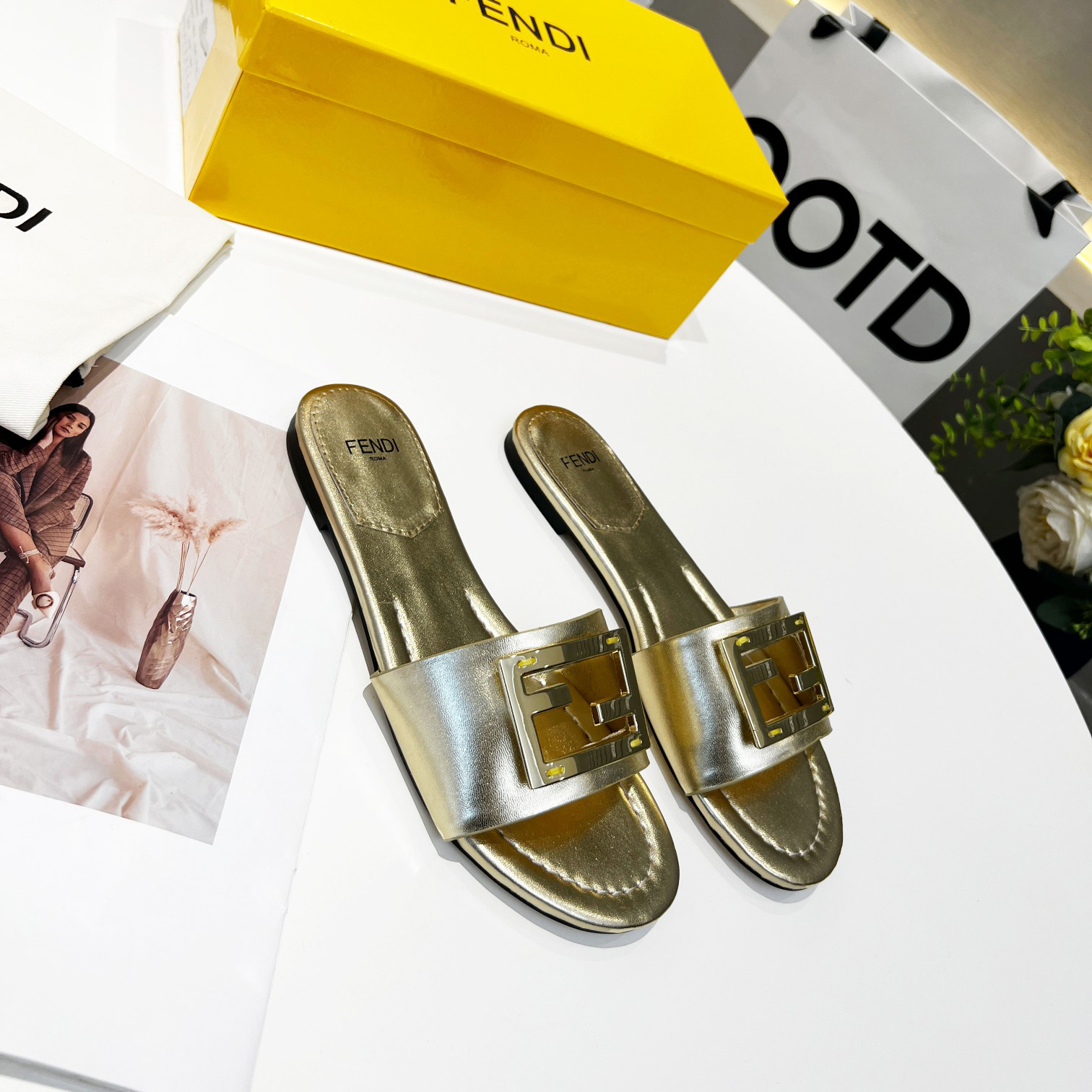 Fendi Baguette Gold nappa leather slides - 