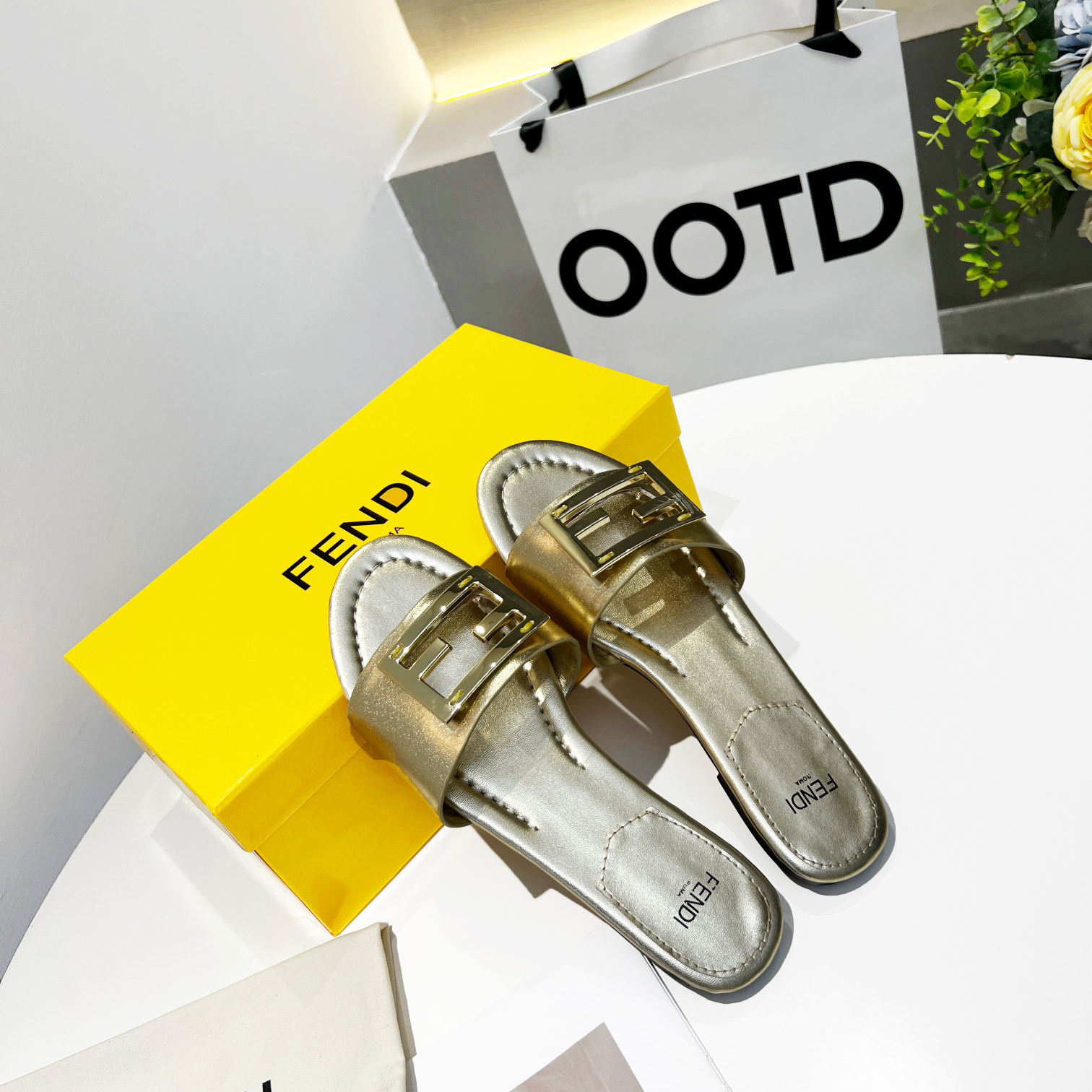 Fendi Baguette Gold nappa leather slides - 