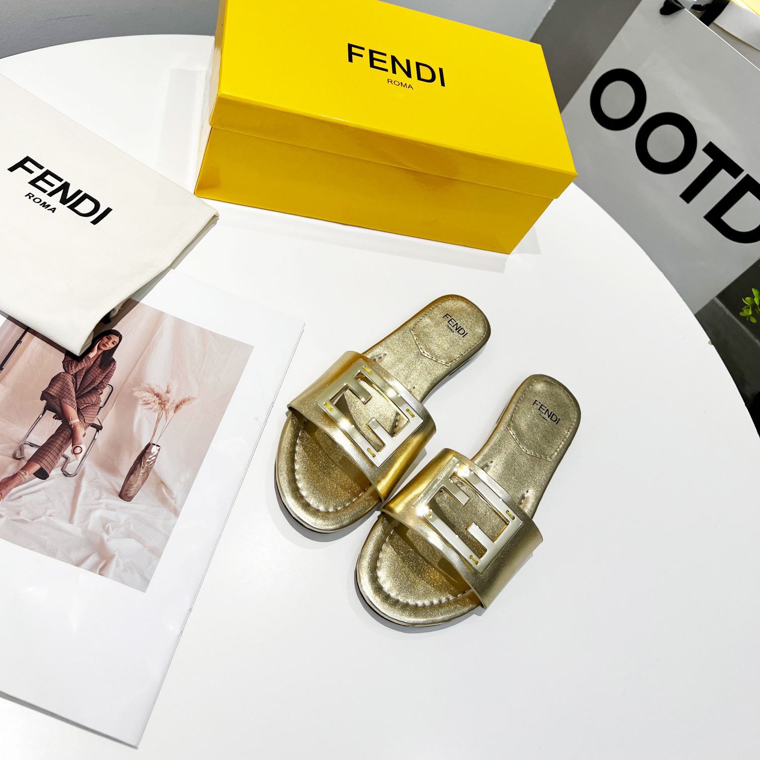 Fendi Baguette Gold nappa leather slides - 