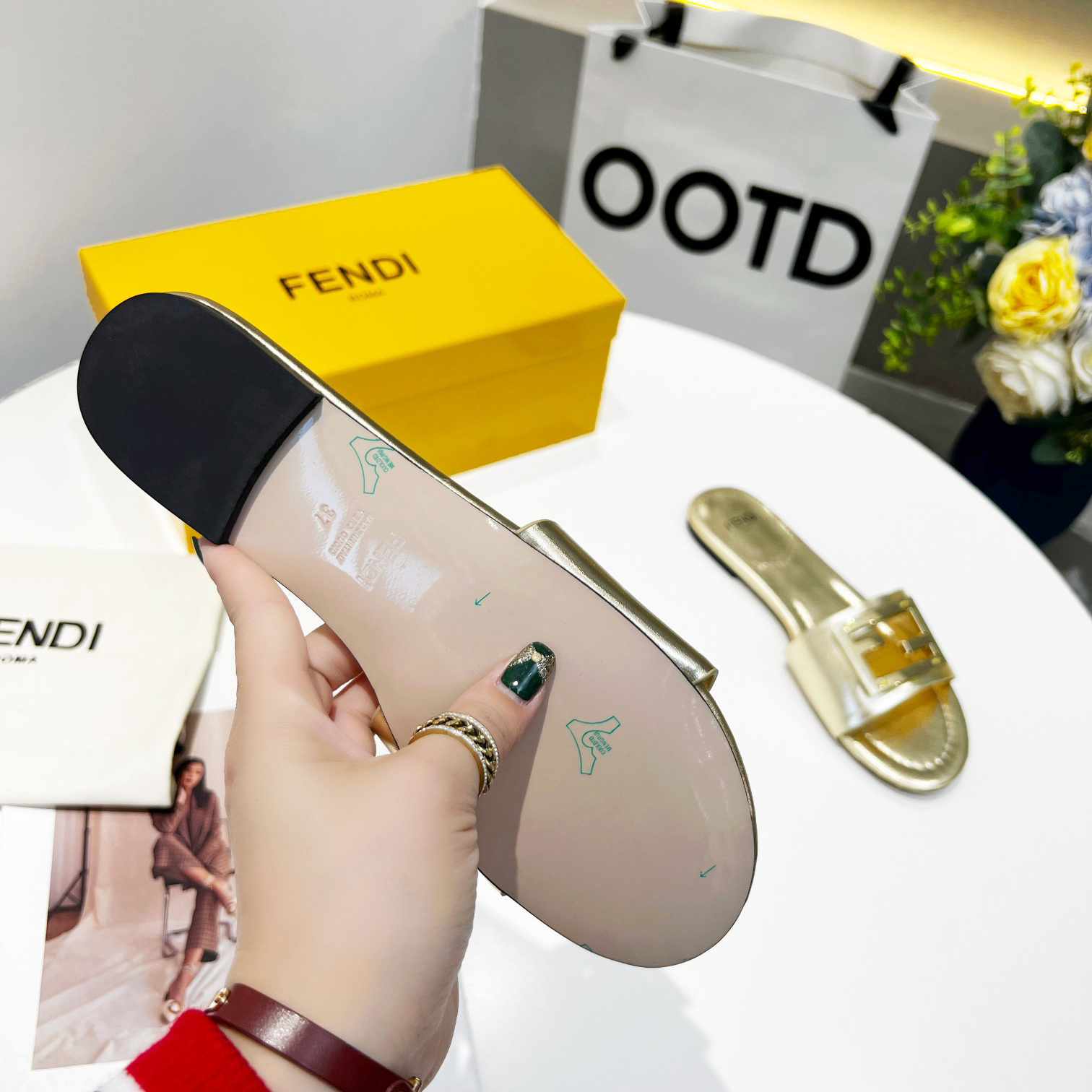 Fendi Baguette Gold nappa leather slides - 