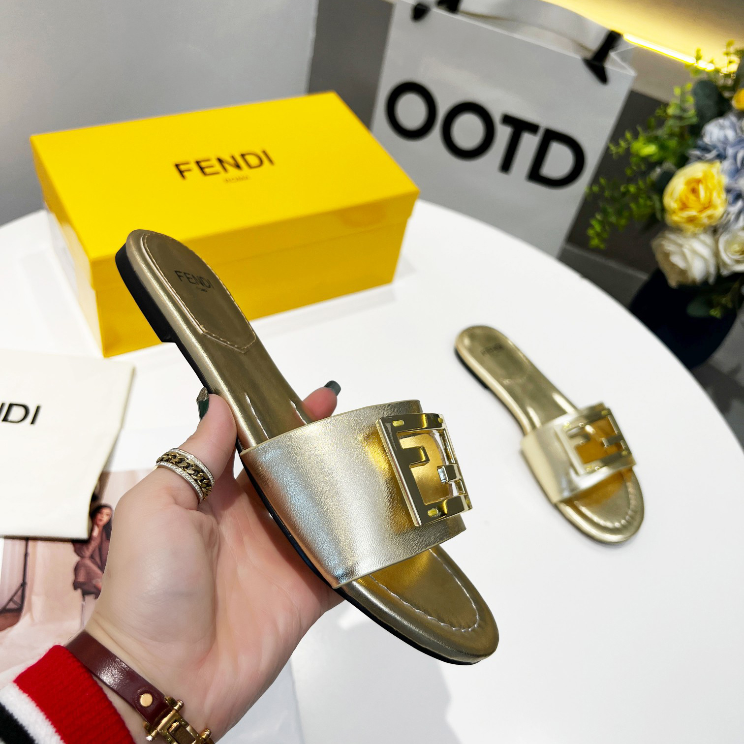 Fendi Baguette Gold nappa leather slides - 