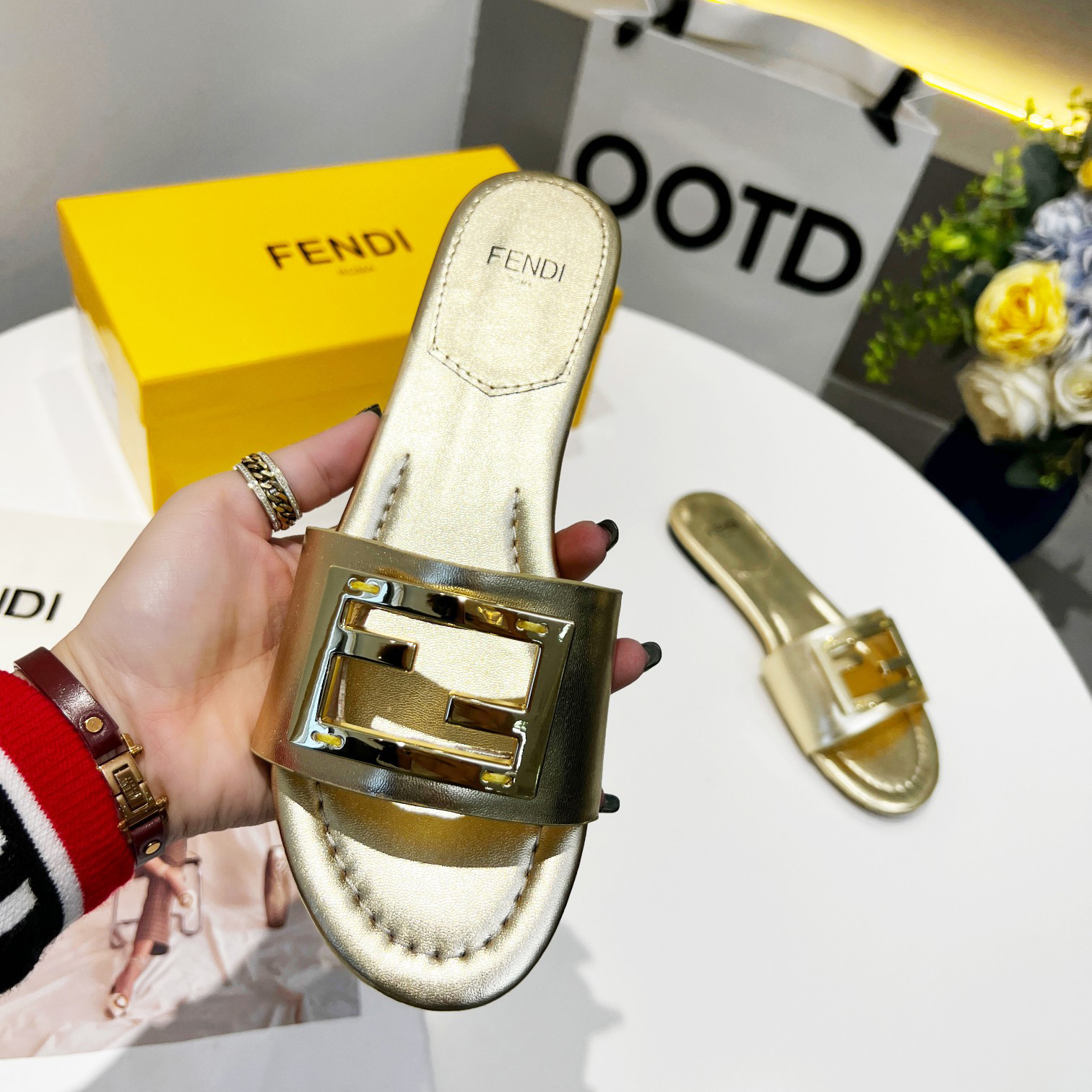 Fendi Baguette Gold nappa leather slides - 