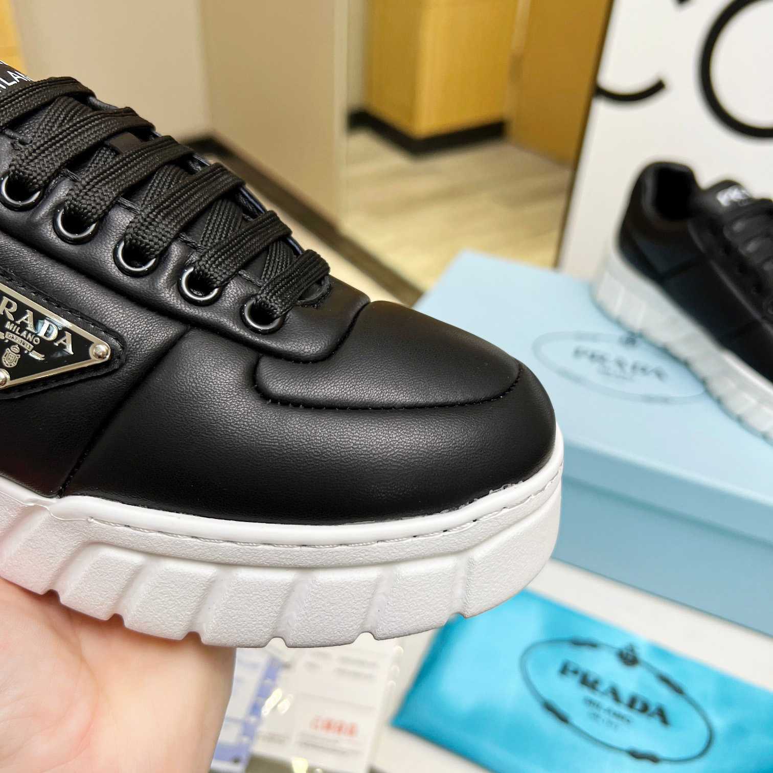 Prada Padded Nappa Leather Sneakers - PerfectKickZ