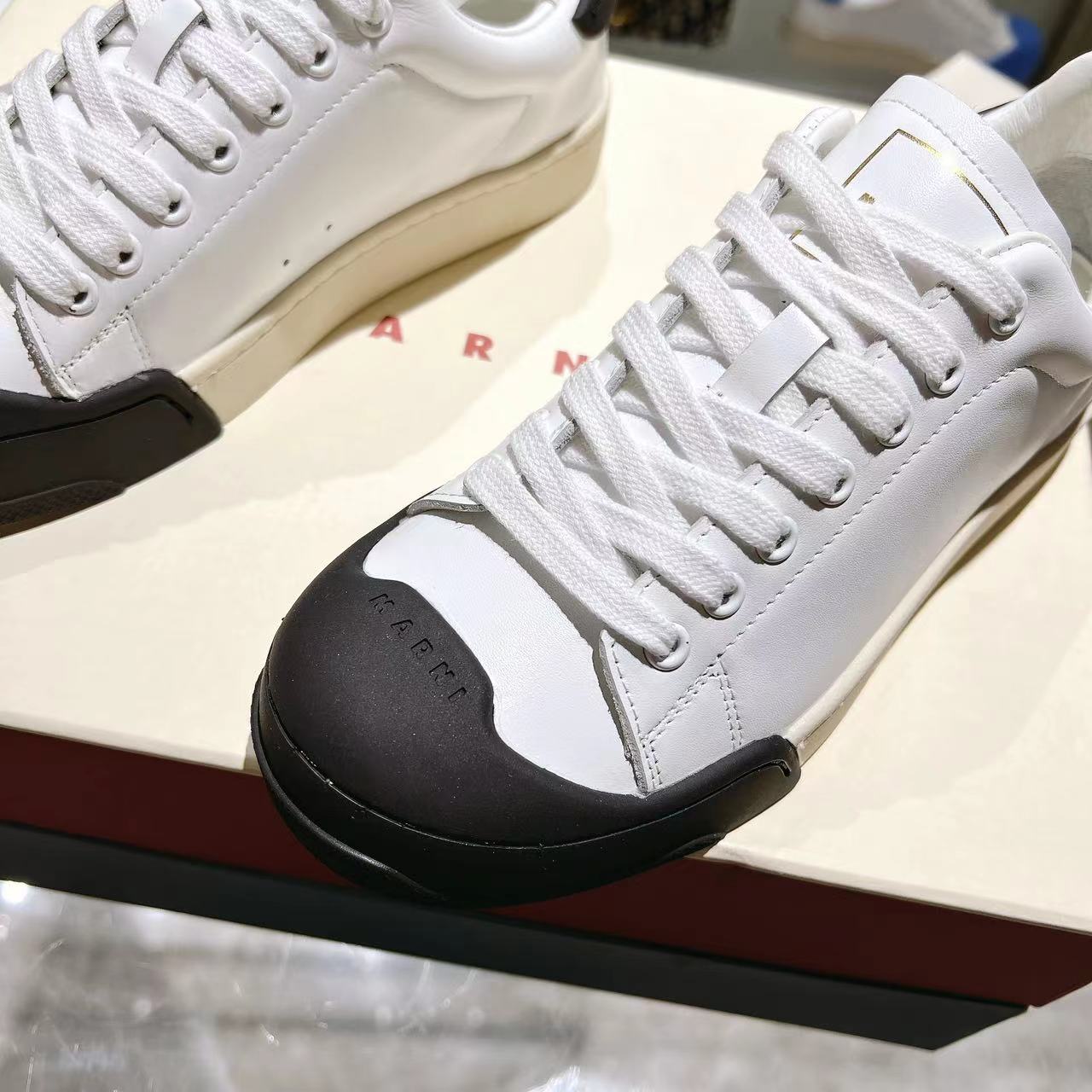 Marni Dada Bumper Sneaker In White And Black Leather - PerfectKickZ
