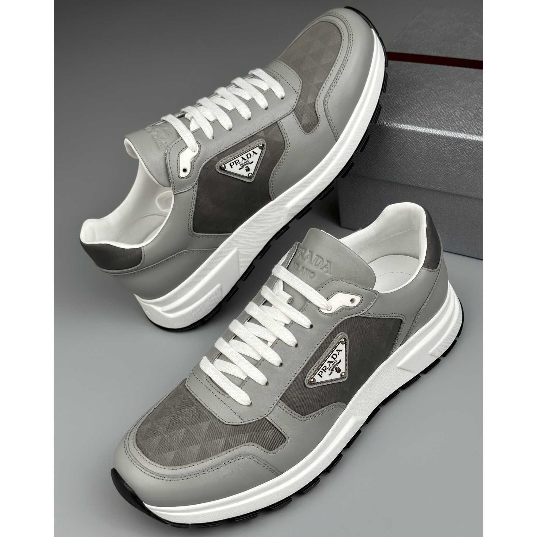 Prada Leather And Re-Nylon High-top Sneakers - PerfectKickZ