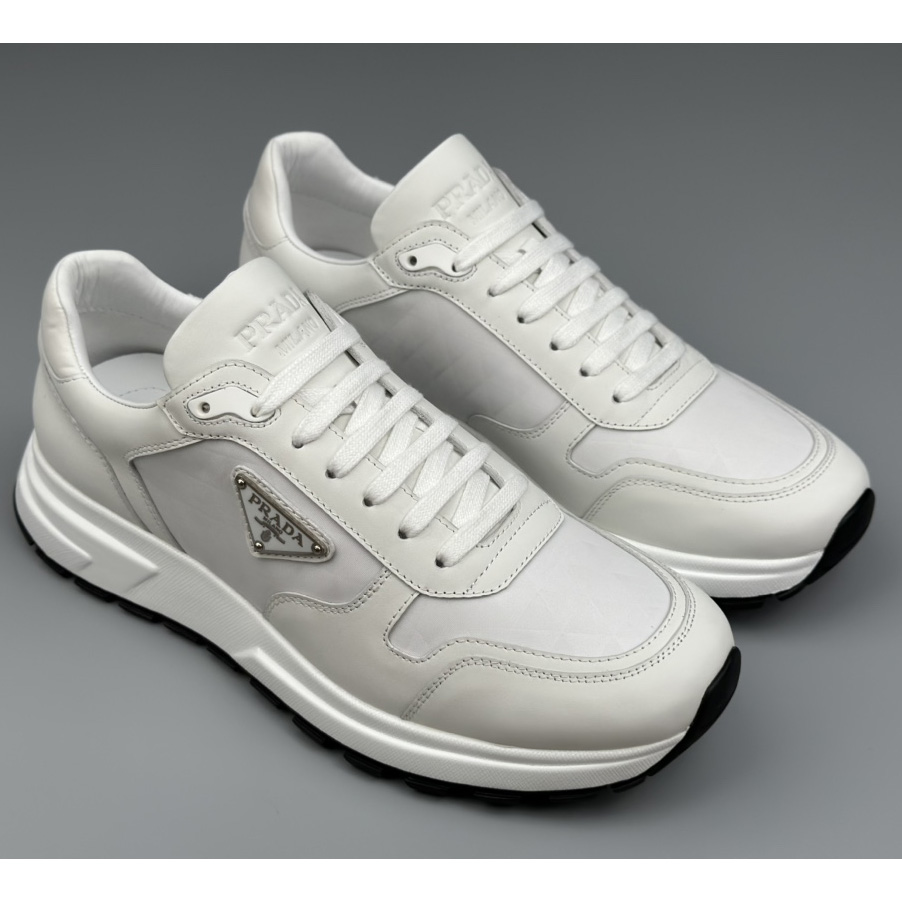 Prada Leather And Re-Nylon High-top Sneakers - PerfectKickZ