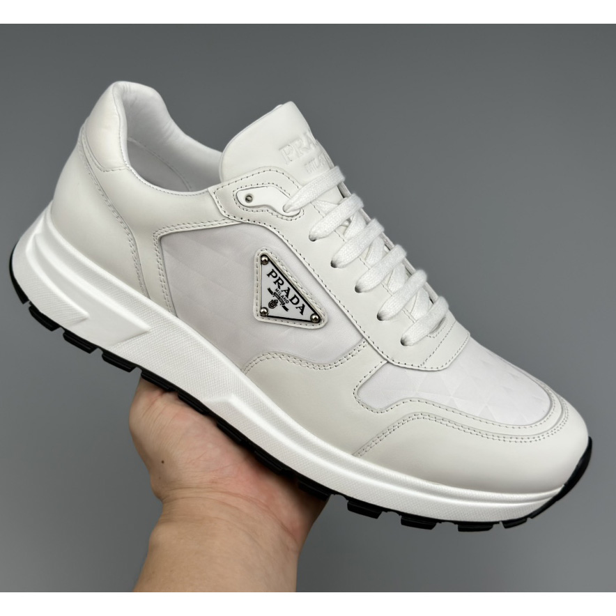 Prada Leather And Re-Nylon High-top Sneakers - PerfectKickZ